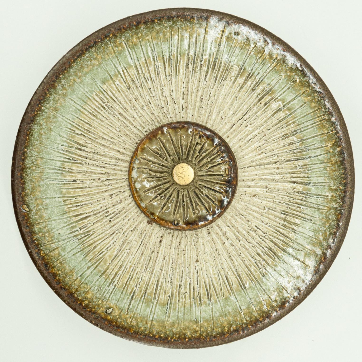 Spectacular circular ceramic wall light, with beautiful accents. Manufactured in Denmark in the 1970s. Labelled and signed by Axella, in excellent condition. Axella was found in the 70s in Denmark by Aksel Larsen, who later changed his name to