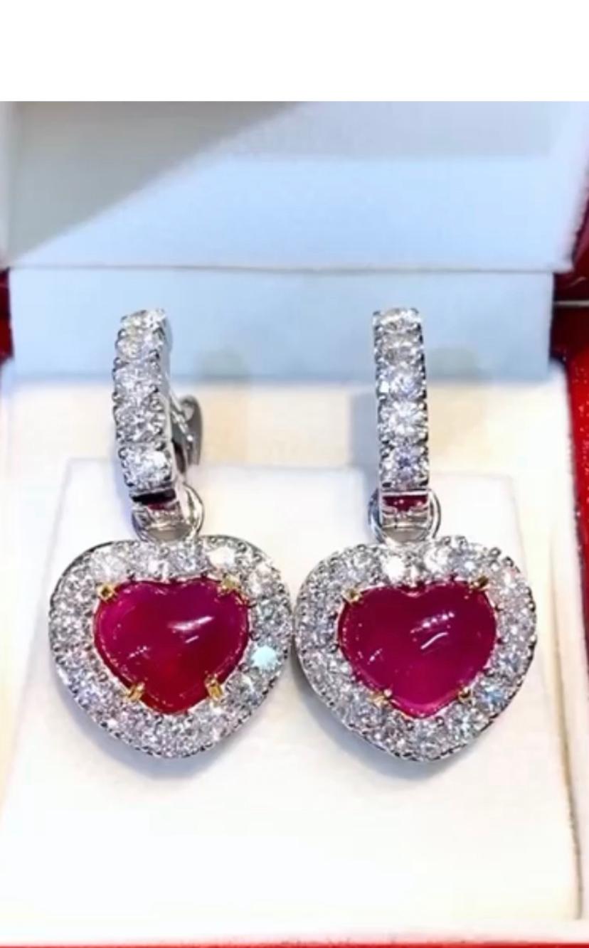 An exclusive and refined design from love collection, in 18k gold with two heart cut rubies 
ct  8 and round brilliant cut diamonds ct 3,50 F/VS.
Handmade by artisan goldsmith.
Excellent manufacture and quality.
Complete with AIG report.

Note: on