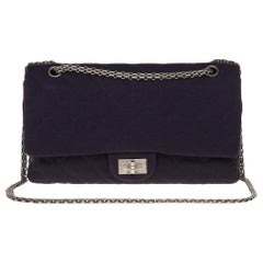 Stunning Chanel 2.55 handbag in quilted navy blue jersey and silver hardware