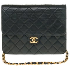 Stunning Chanel Classic handbag in black quilted lambskin with gold hardware