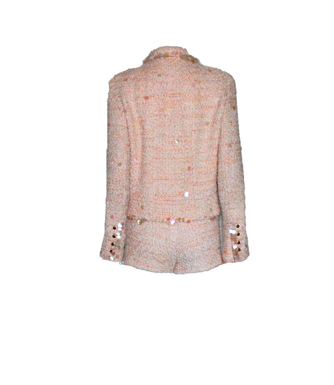 Amazing Chanel suit
In the signature fantasy tweed fabric exclusively produced by Maison Lesage
Designed by Karl Lagerfeld for his iconic 1995 Chanel collection
Collectable item
Shiny big sequins
CC logo buttons on sleeves
Amazing pastel