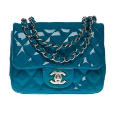 Stunning Chanel Mini Timeless shoulder bag in Blue quilted patent leather, SHW