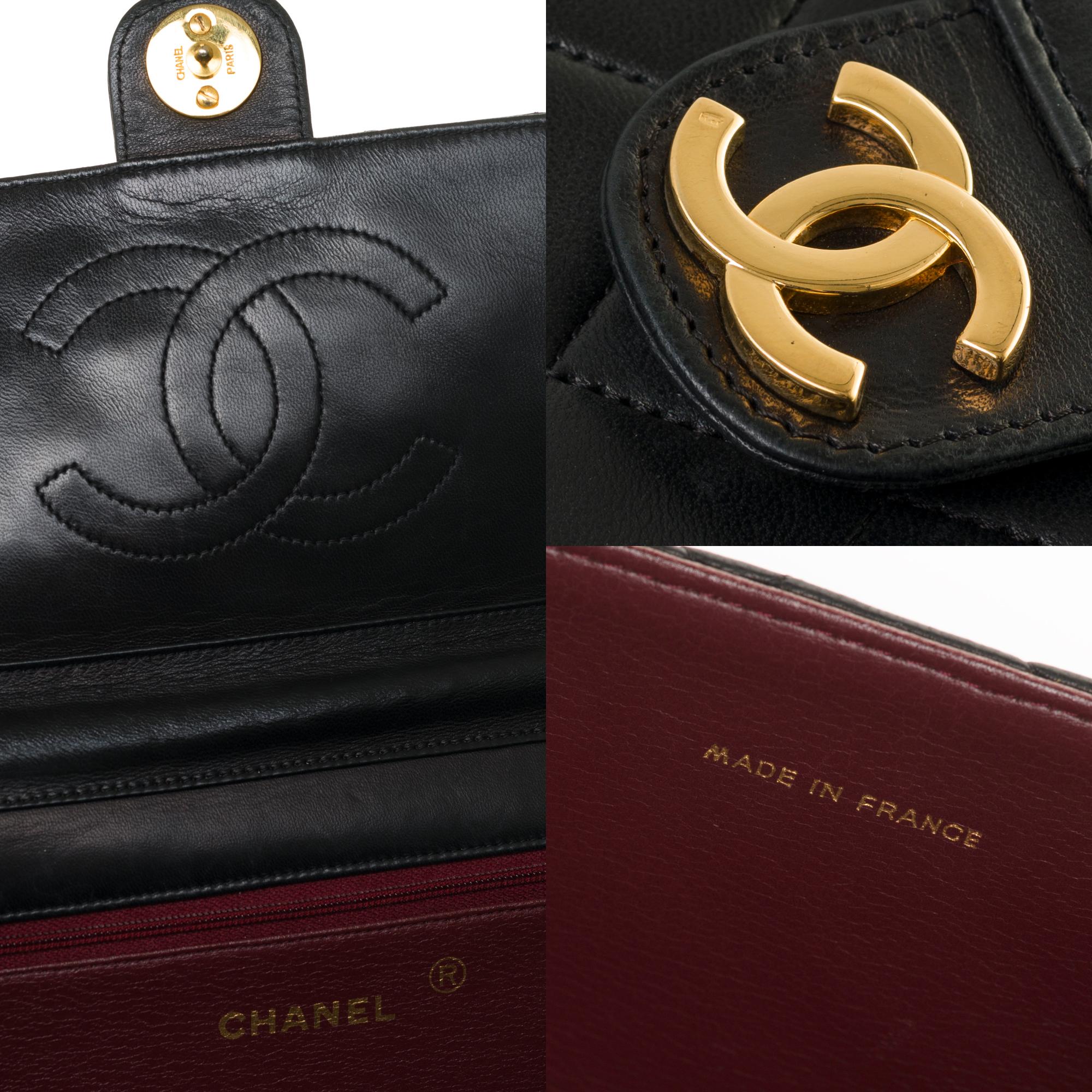 Women's Stunning Chanel Classic handbag in black quilted lambskin with gold hardware