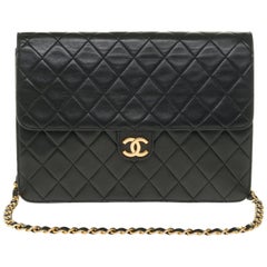 Stunning Chanel Classic handbag in black quilted lambskin with gold hardware