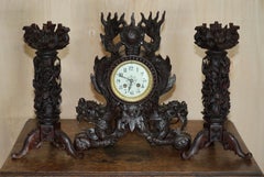 impresionante reloj manto dragón de madera tallada a mano de exportación china y candelabros