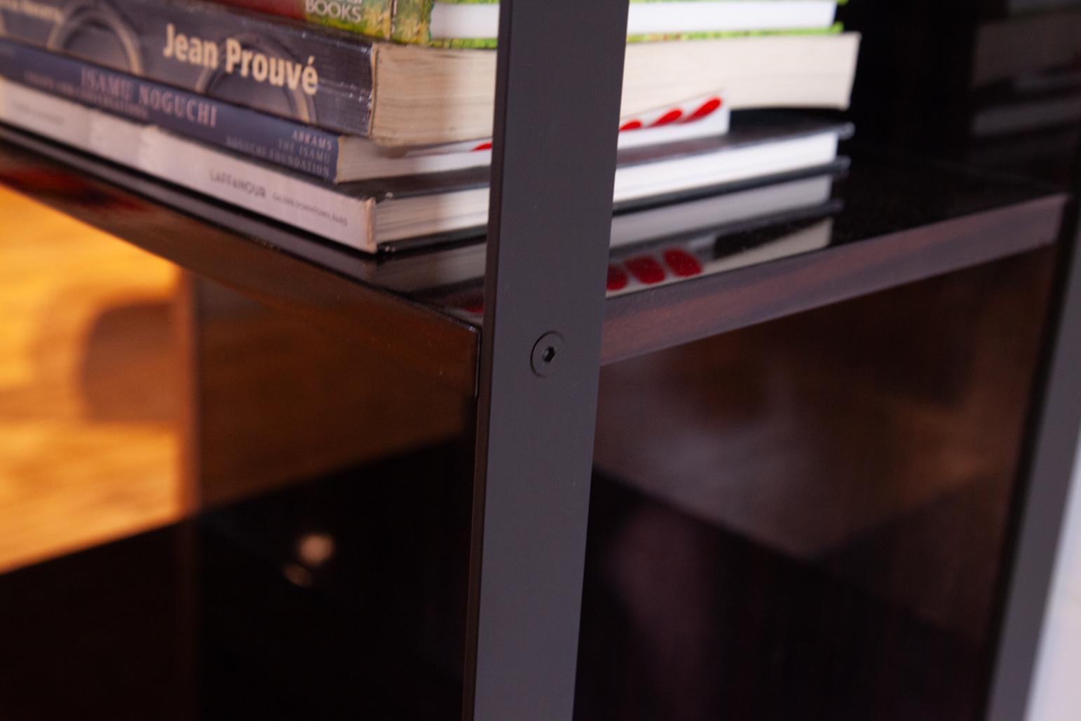 Incredible lacquered massacre ebony shelf with metal frame by Christian Liaigre. Purchased from Liaigre showroom in NYC in 2012. Great overall condition. Retail price was approximately $30,000.

Ships from Philadelphia. 

We have the largest