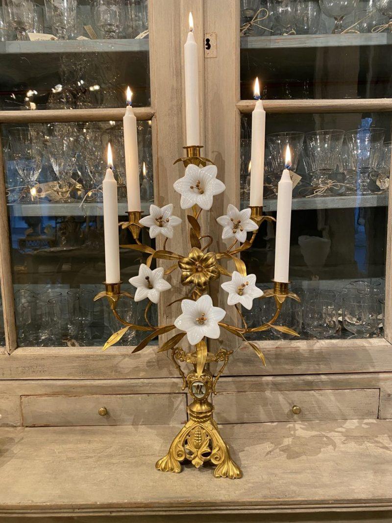 Wonderful antique candlestick / candelabra, beautifully decorated with one charming brass lilly, and white opaline glass lilies.

This religious candelabra dates back to circa 1900, originates from the Catholic Church in France.

Also known as