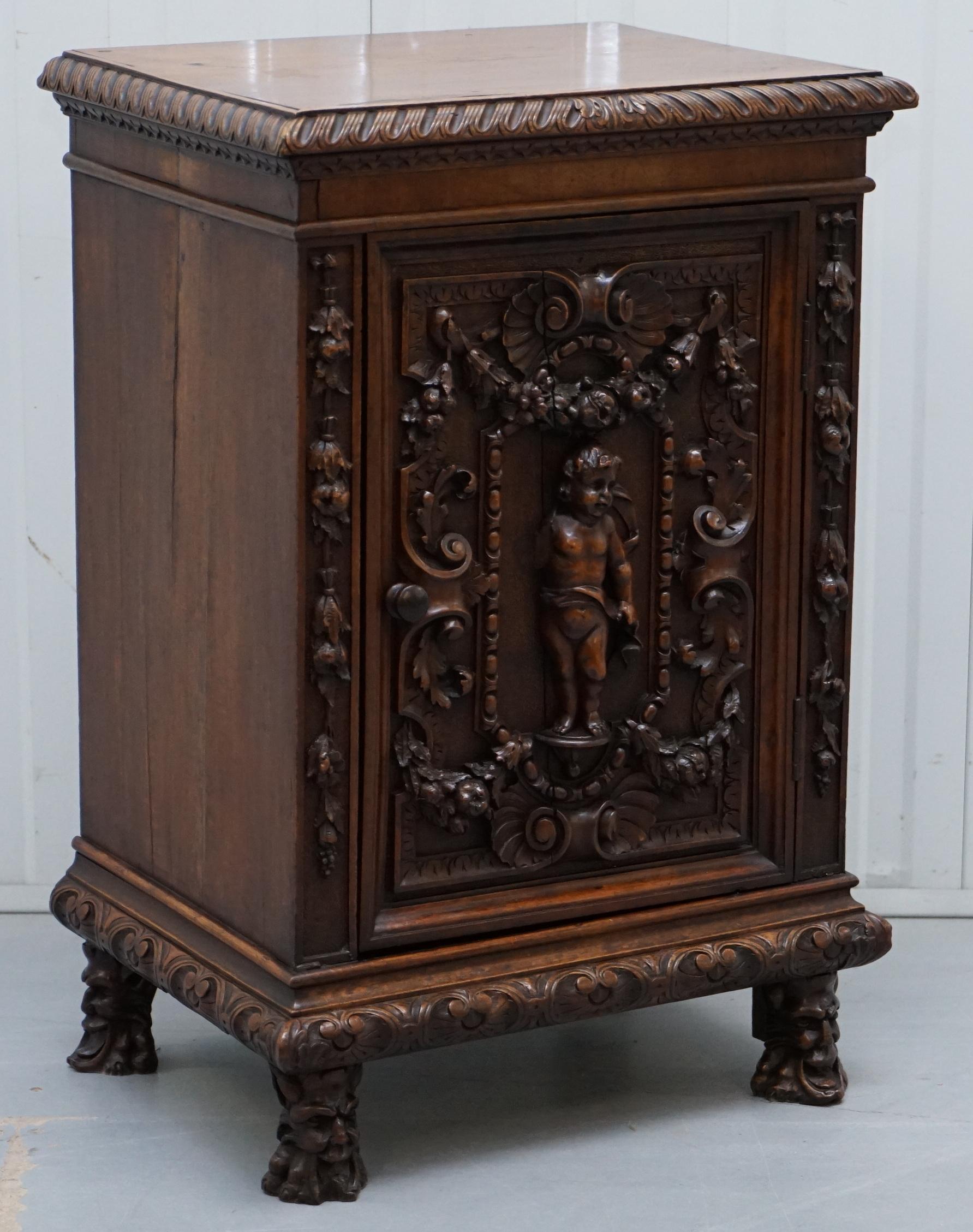 We are delighted to offer for sale this stunning circa 1780 hand carved walnut side cabinet with cherub and floral detailing

Please note the delivery fee listed is just a guide, it covers within the M25 only, for an accurate quote please send me