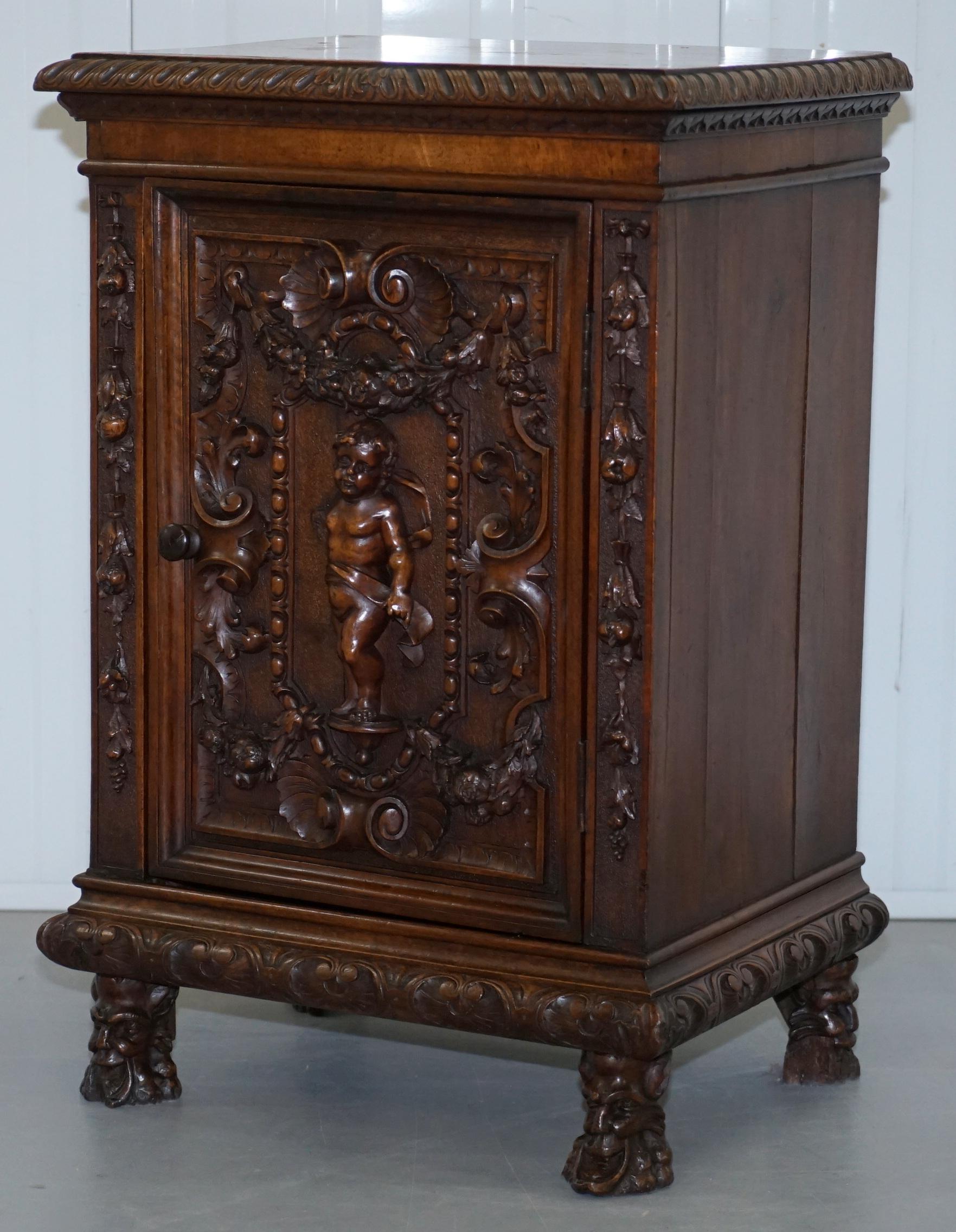 Jacobean Stunning circa 1780 Carved Walnut Side Cabinet with Cherub & Floral Detailing
