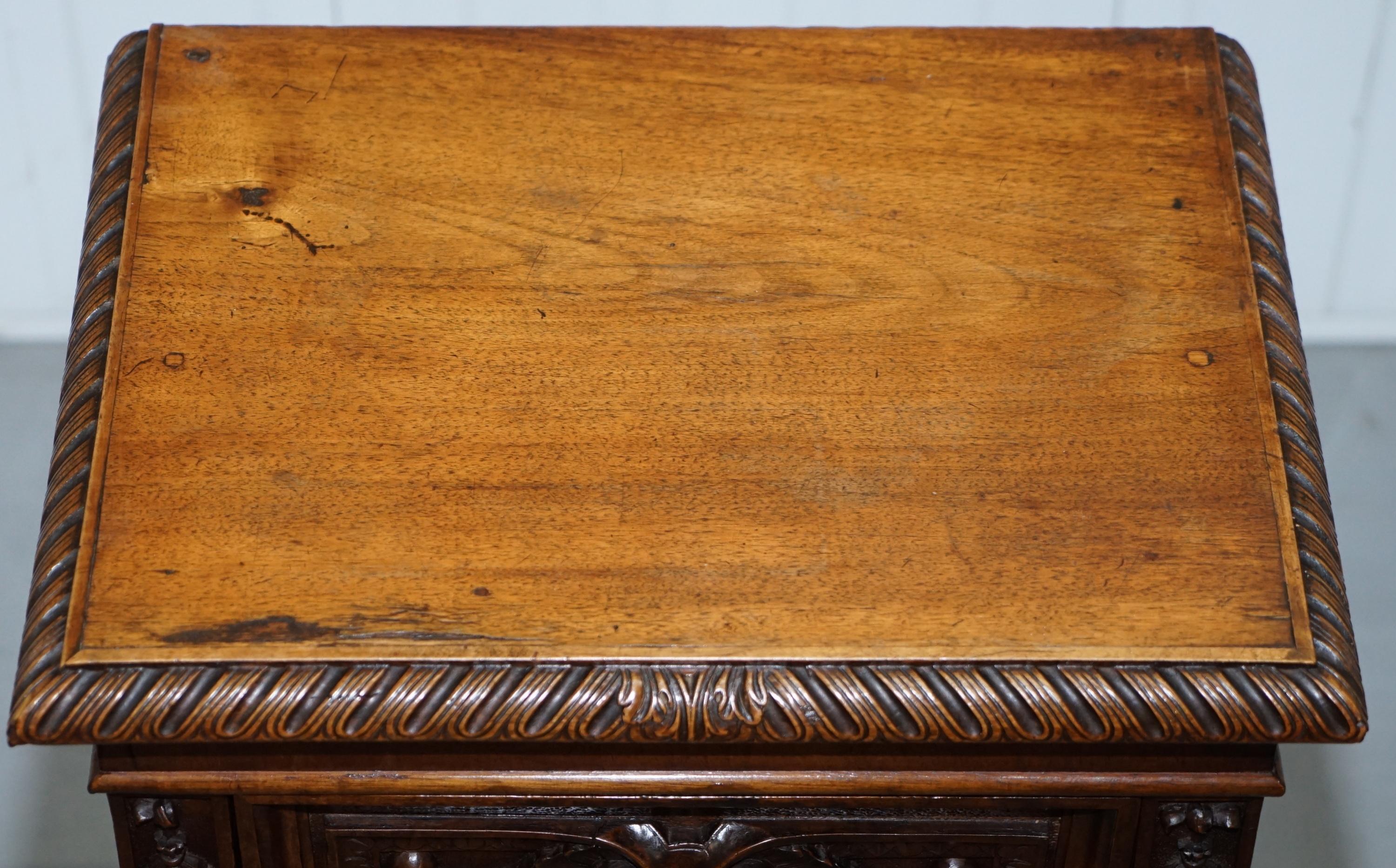 English Stunning circa 1780 Carved Walnut Side Cabinet with Cherub & Floral Detailing