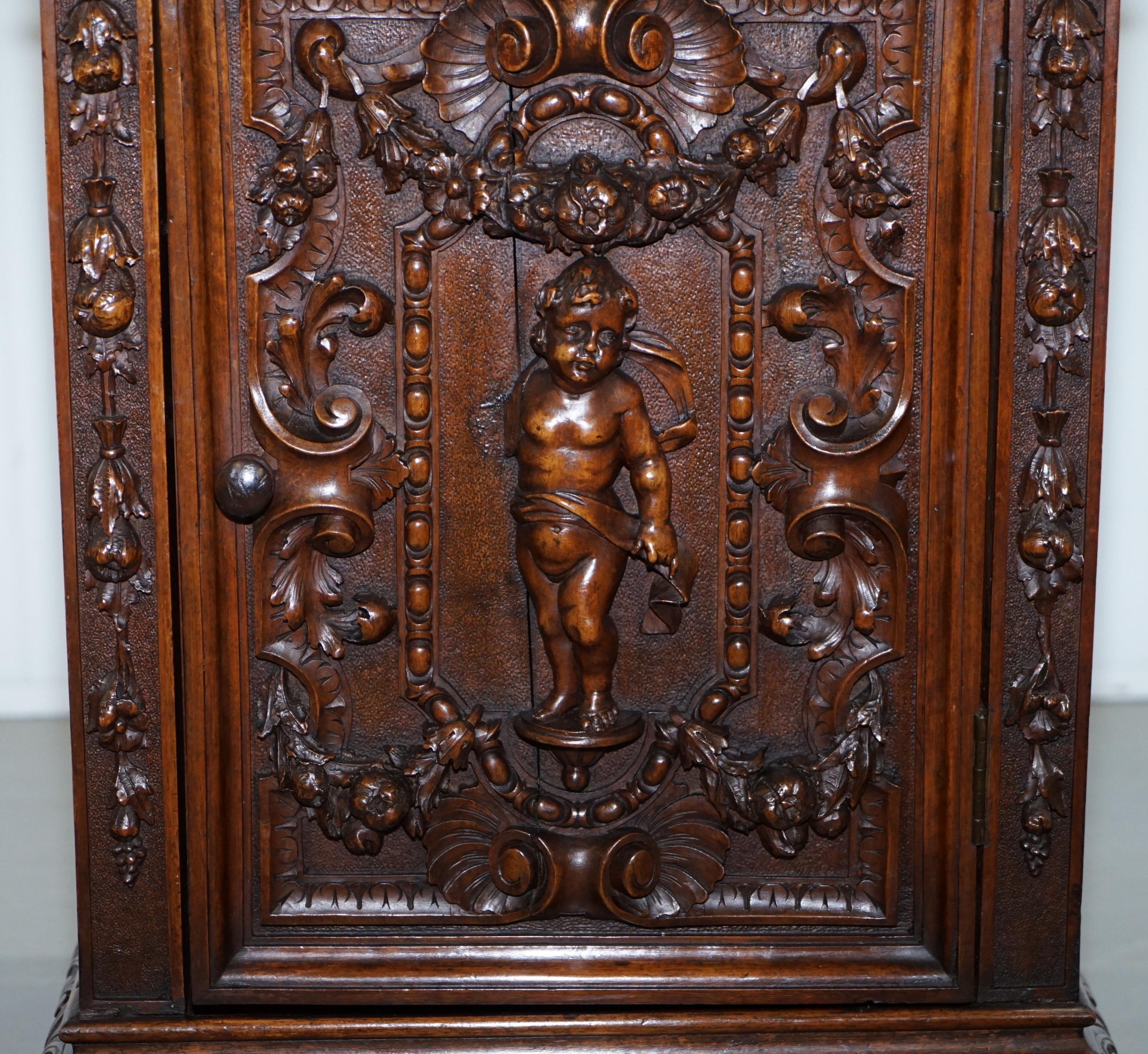 Late 18th Century Stunning circa 1780 Carved Walnut Side Cabinet with Cherub & Floral Detailing
