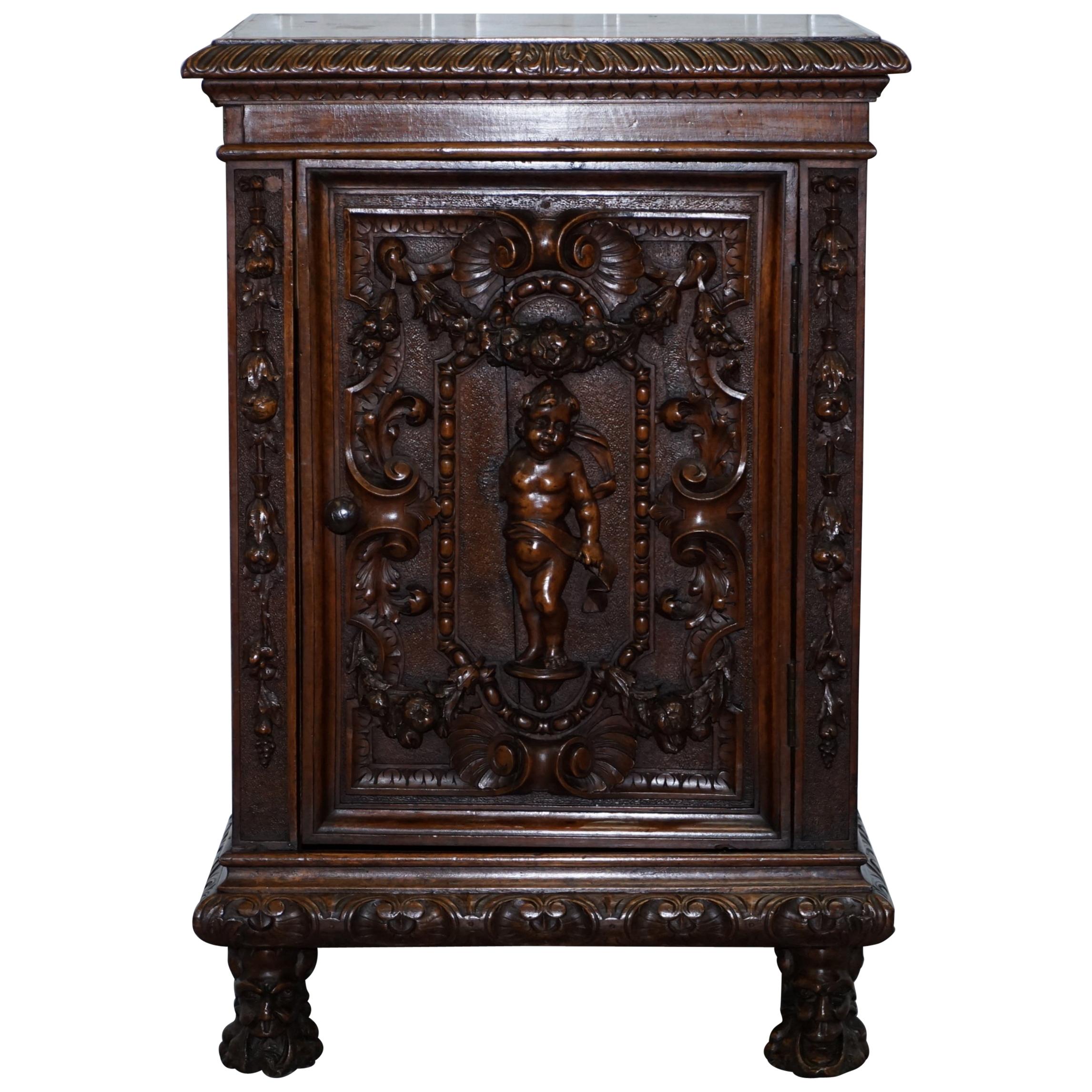Stunning circa 1780 Carved Walnut Side Cabinet with Cherub & Floral Detailing