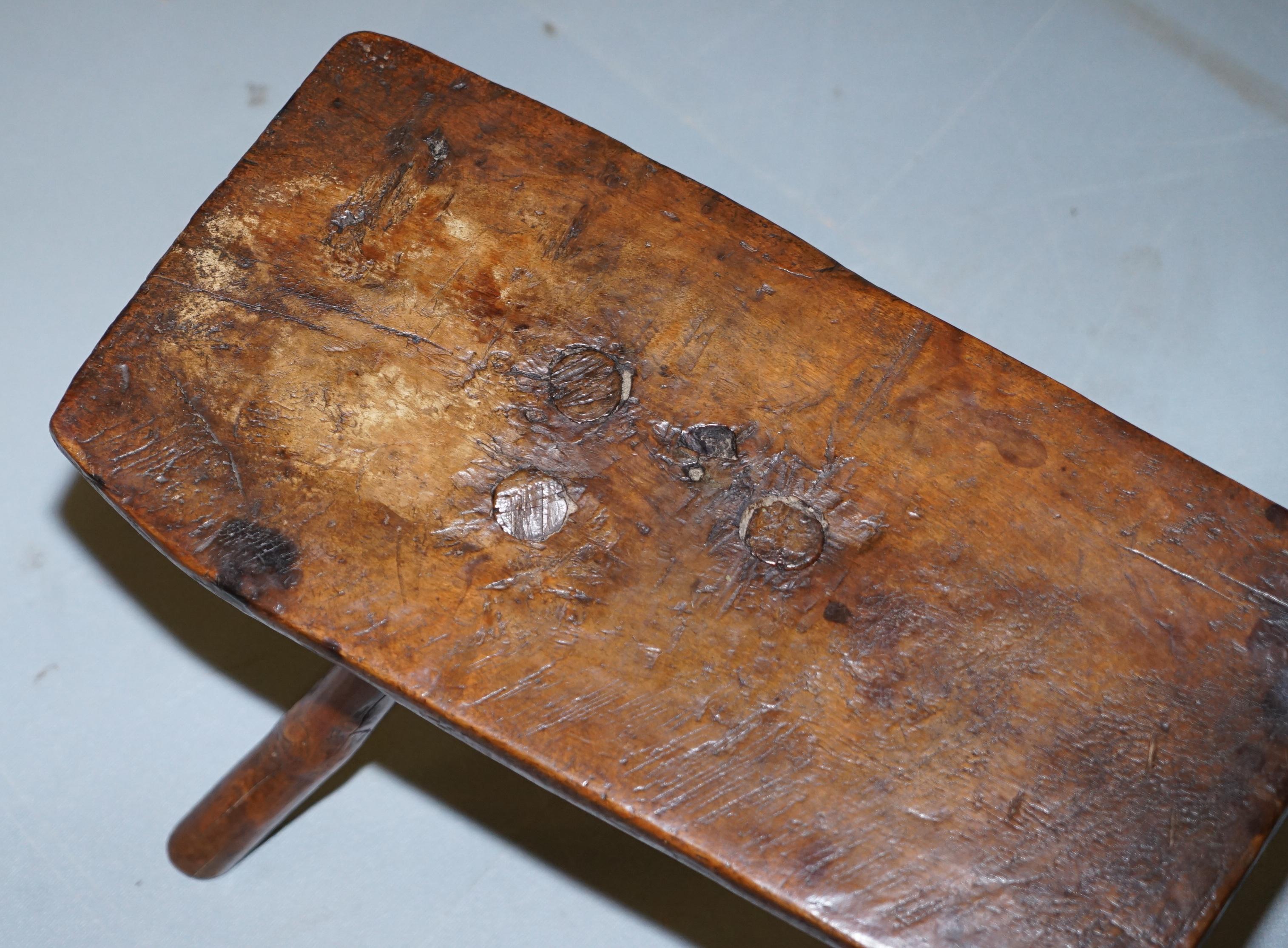 Hand-Crafted Stunning circa 1800 Handmade and Carved Primitive Three-Legged Rectangle Stool