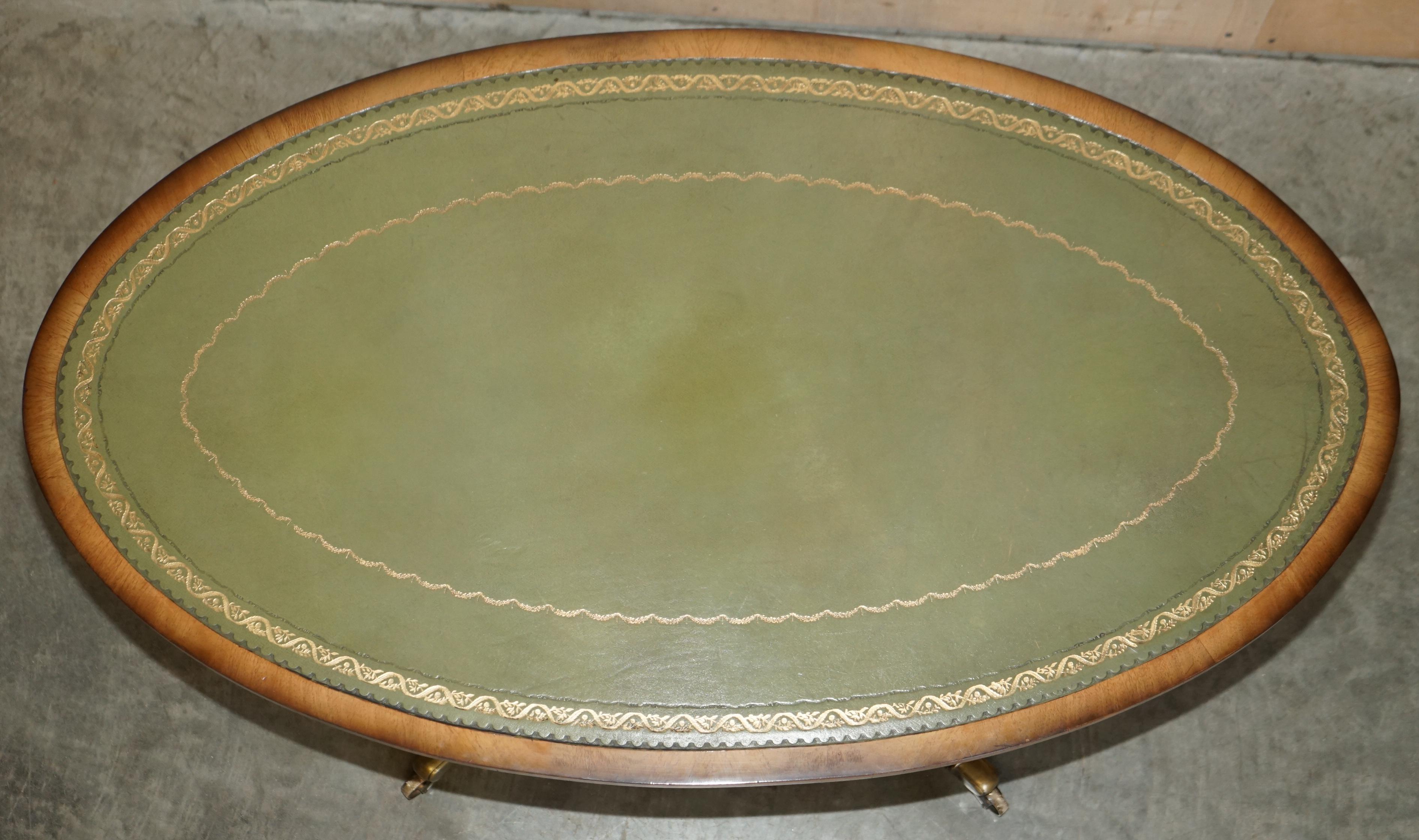 Stunning circa 1900 English Walnut Green Leather Brass Castor Oval Coffee Table For Sale 5