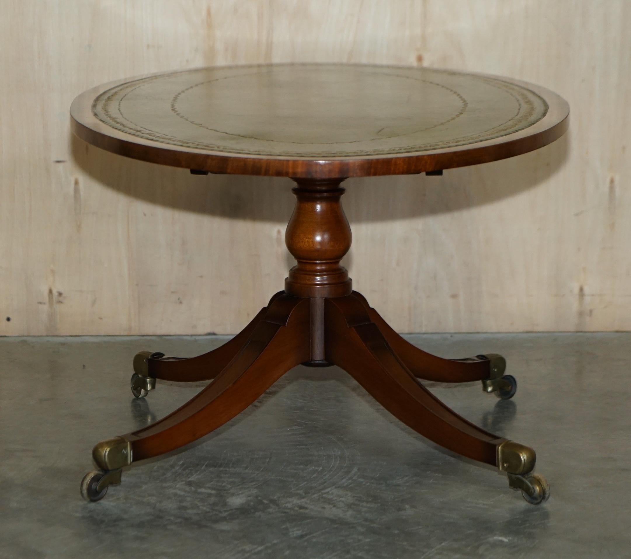 Stunning circa 1900 English Walnut Green Leather Brass Castor Oval Coffee Table For Sale 8