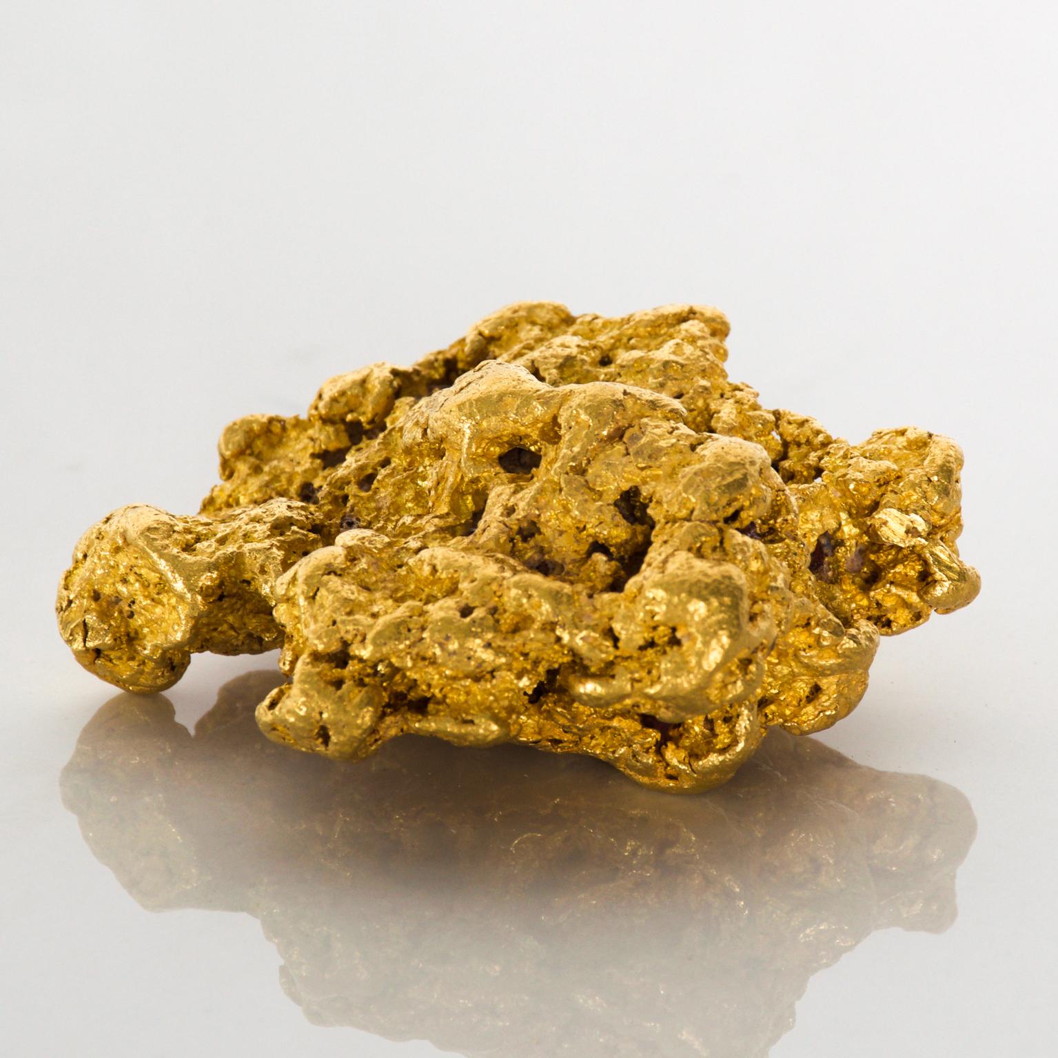 Estate collection large genuine natural gold nugget from Australia
gold nugget weighs approximately 269.5 grams. 
tested at local refinery purity of .94405.
2.75 wide x 2.31 depth x .88 Tall inches weight is 269.5 grams.
Nugget is in its original