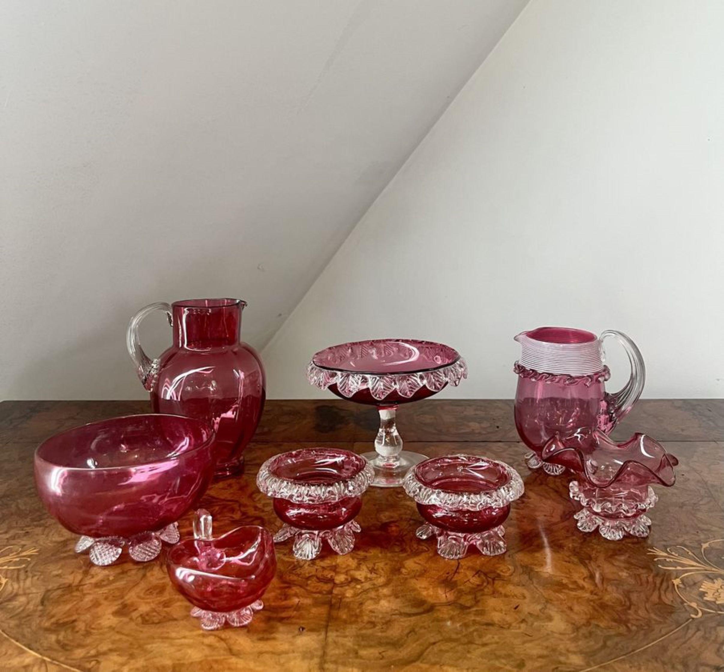 Stunning collection of quality antique Victorian cranberry glass consisting of eight cranberry glass items, two jugs, a pair of table salts and four bowls.

D. 1880