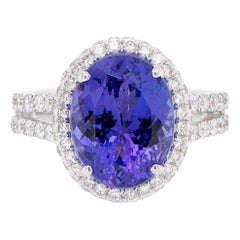 Stunning Color 4.78 Carat Oval Tanzanite Ring with Diamonds 1.01 Carats 18K Gold
