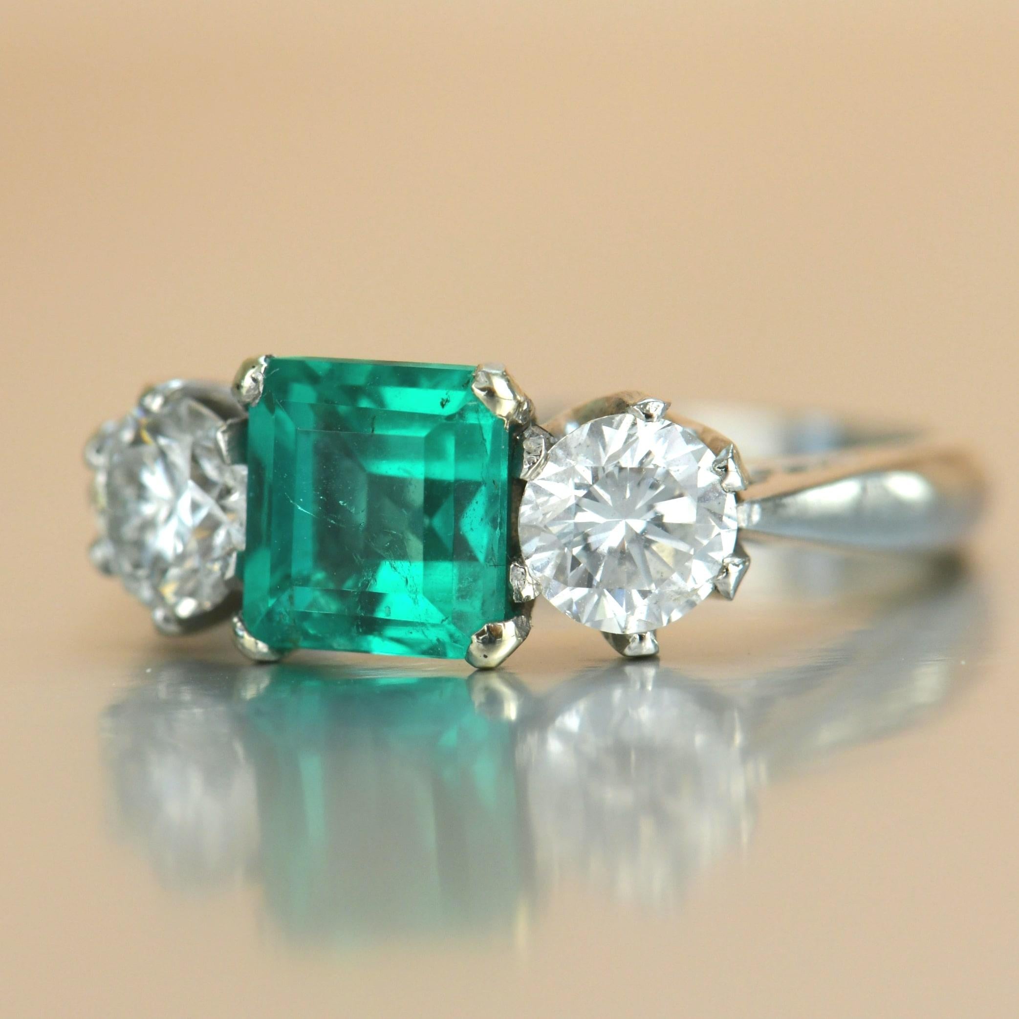 Stunning Columbia Emerald Diamond Platinum Three Stone Engagement Ring For Sale 4