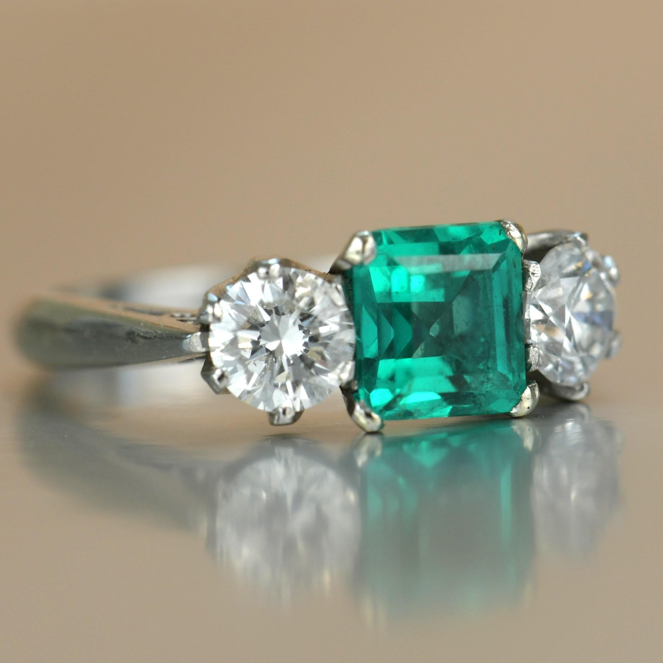 Stunning Columbia Emerald Diamond Platinum Three Stone Engagement Ring For Sale 5