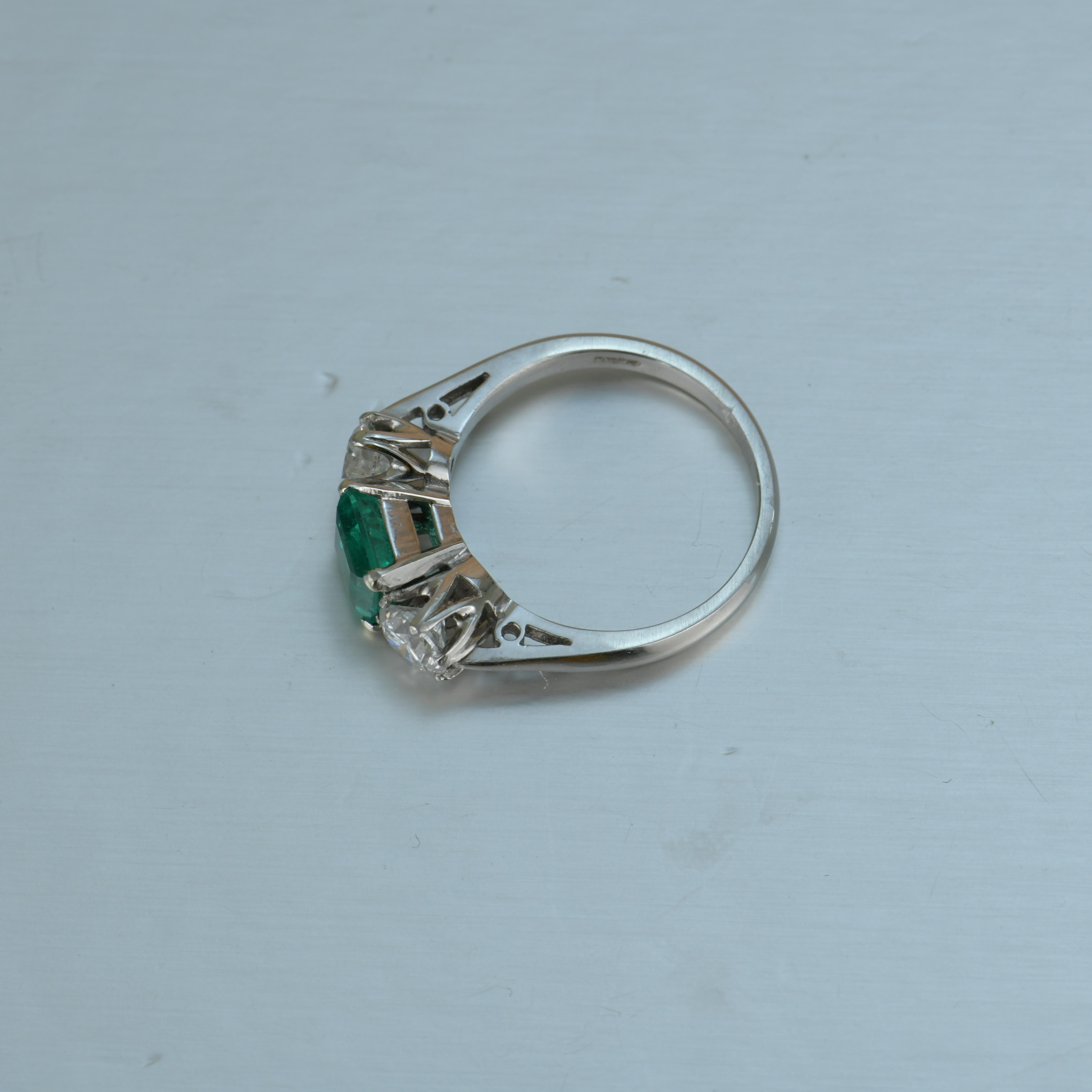 Stunning Columbia Emerald Diamond Platinum Three Stone Engagement Ring For Sale 1