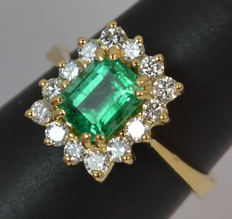 
An absolutely fantastic Emerald and Diamond ring, a contemporary example of art deco design.

​Designed in 18 carat yellow gold.

​Set with an emerald cut emerald to centre in double claw mount, 5.6mm x 7.0mm approx. A deep vivid green to the