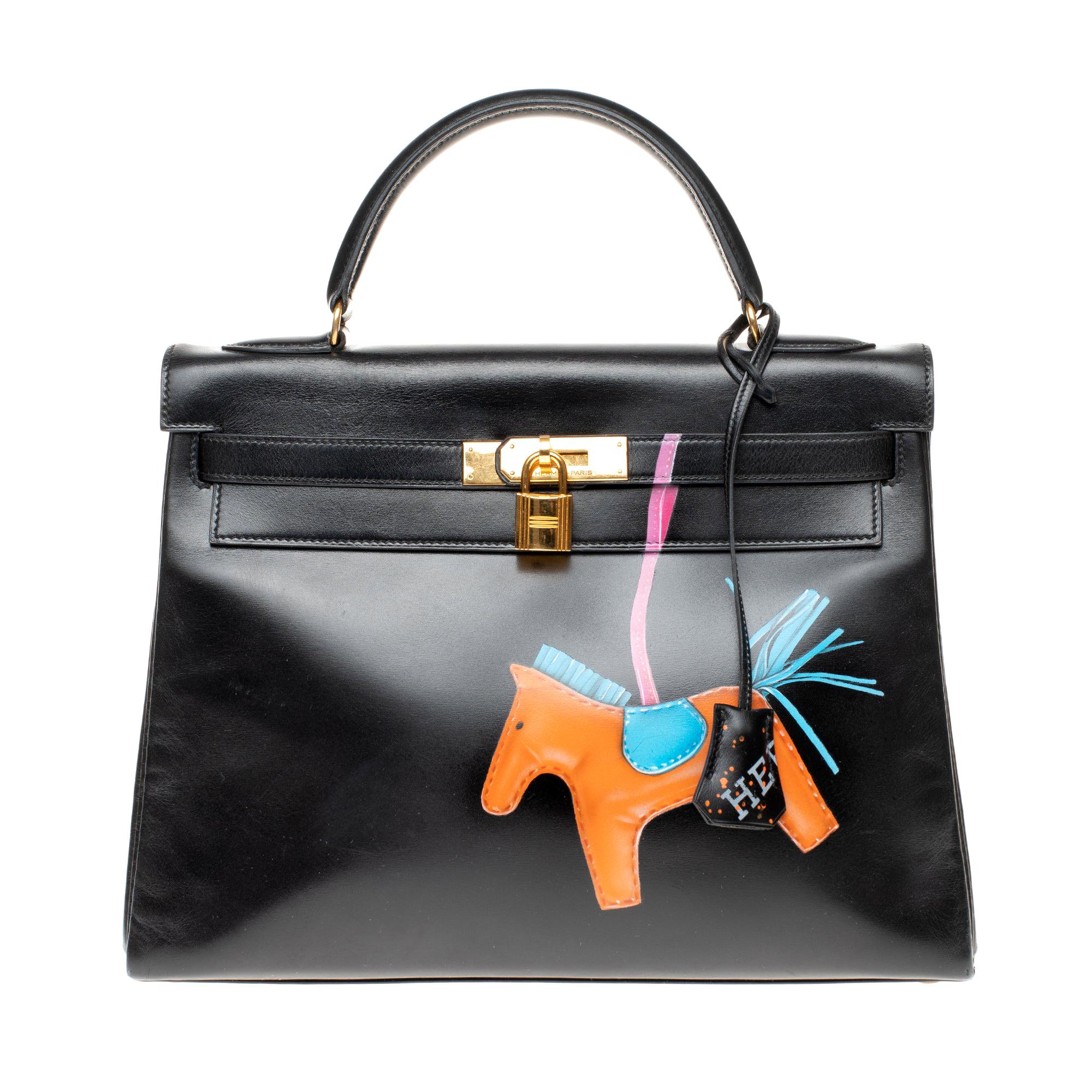 Stunning Creation Kelly 32 "Rodeo" handbag in black calfskin , gold hardware