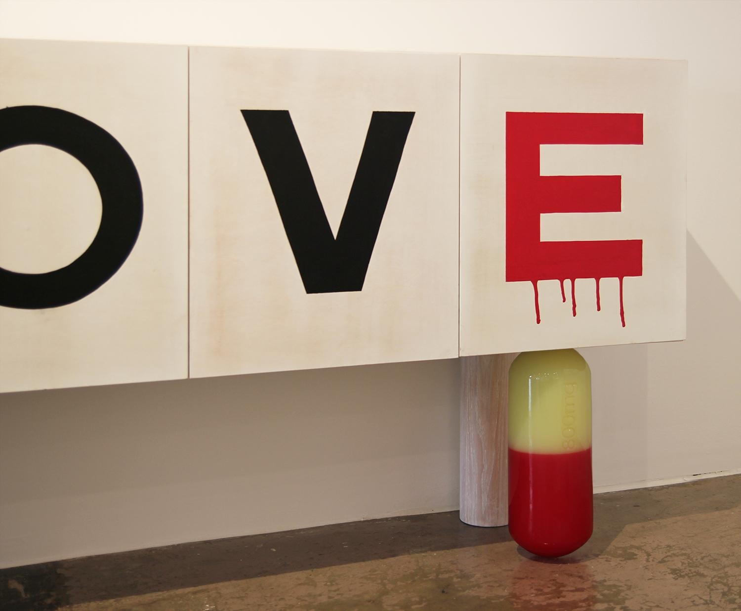 Stunning custom abstract postmodern sideboard with the letters L-O-V-E spelled on the door fronts. This handmade sideboard was custom made in Houston, Texas in collaboration with conceptual artist Matthew Reeves. This custom sideboard features a leg