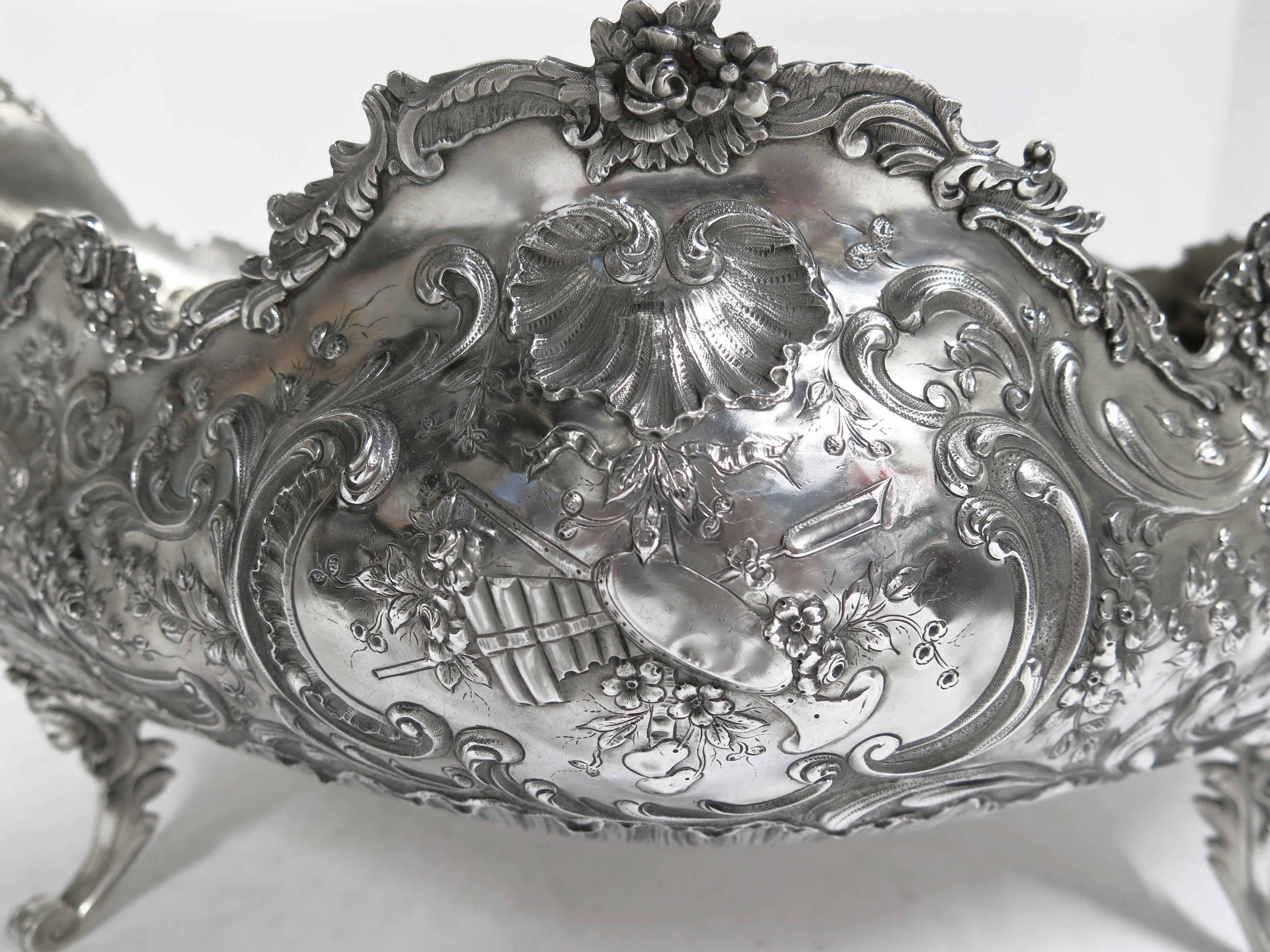 A large oval footed, beautifully hand chased centerpiece bowl made by the French Parisian silversmith Emile Delaire, circa 1890s.
The centerpiece measures 21.50