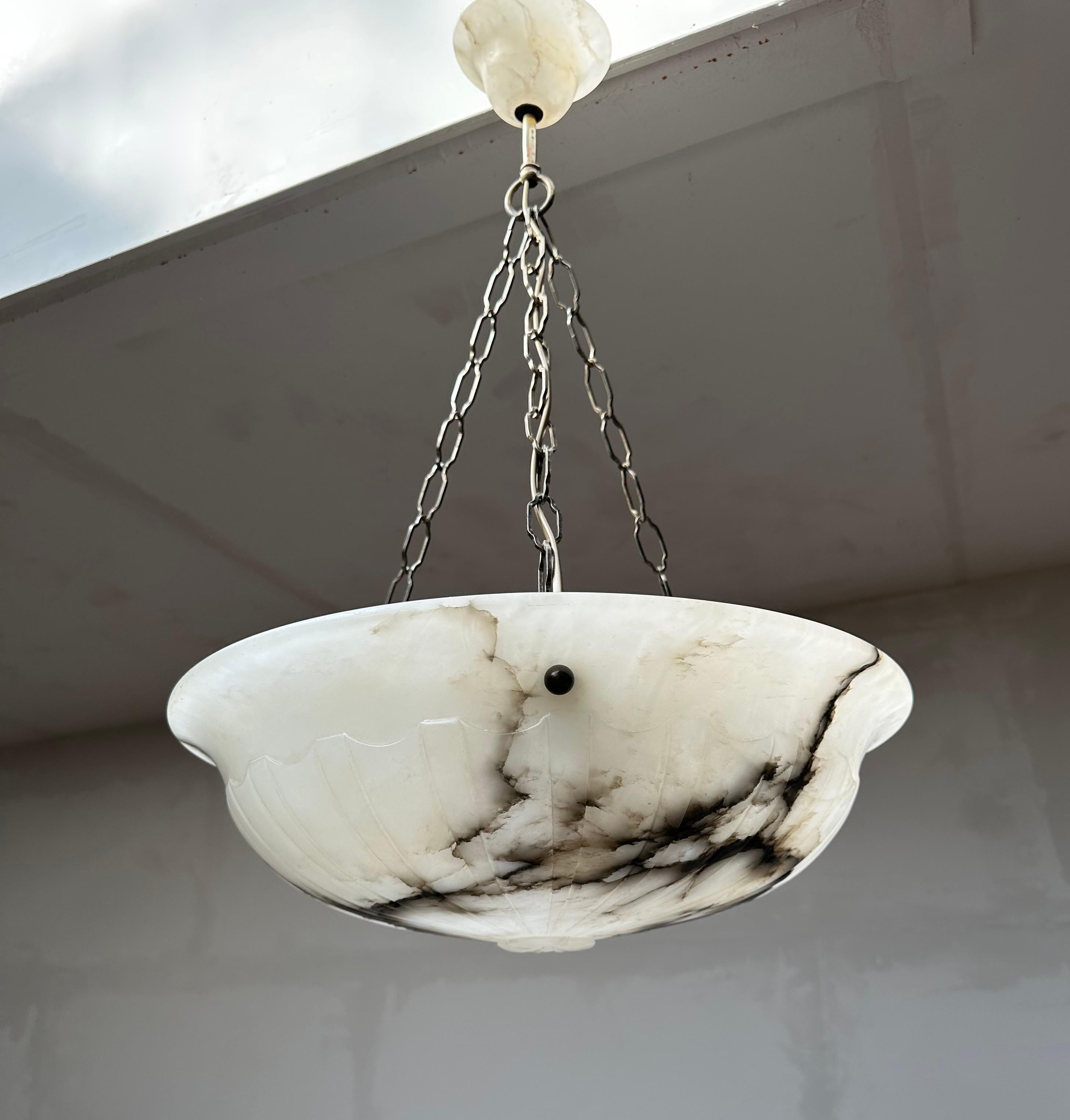 Superb condition chandelier with a stunning and good size alabaster mineral stone shade with a rare carved 