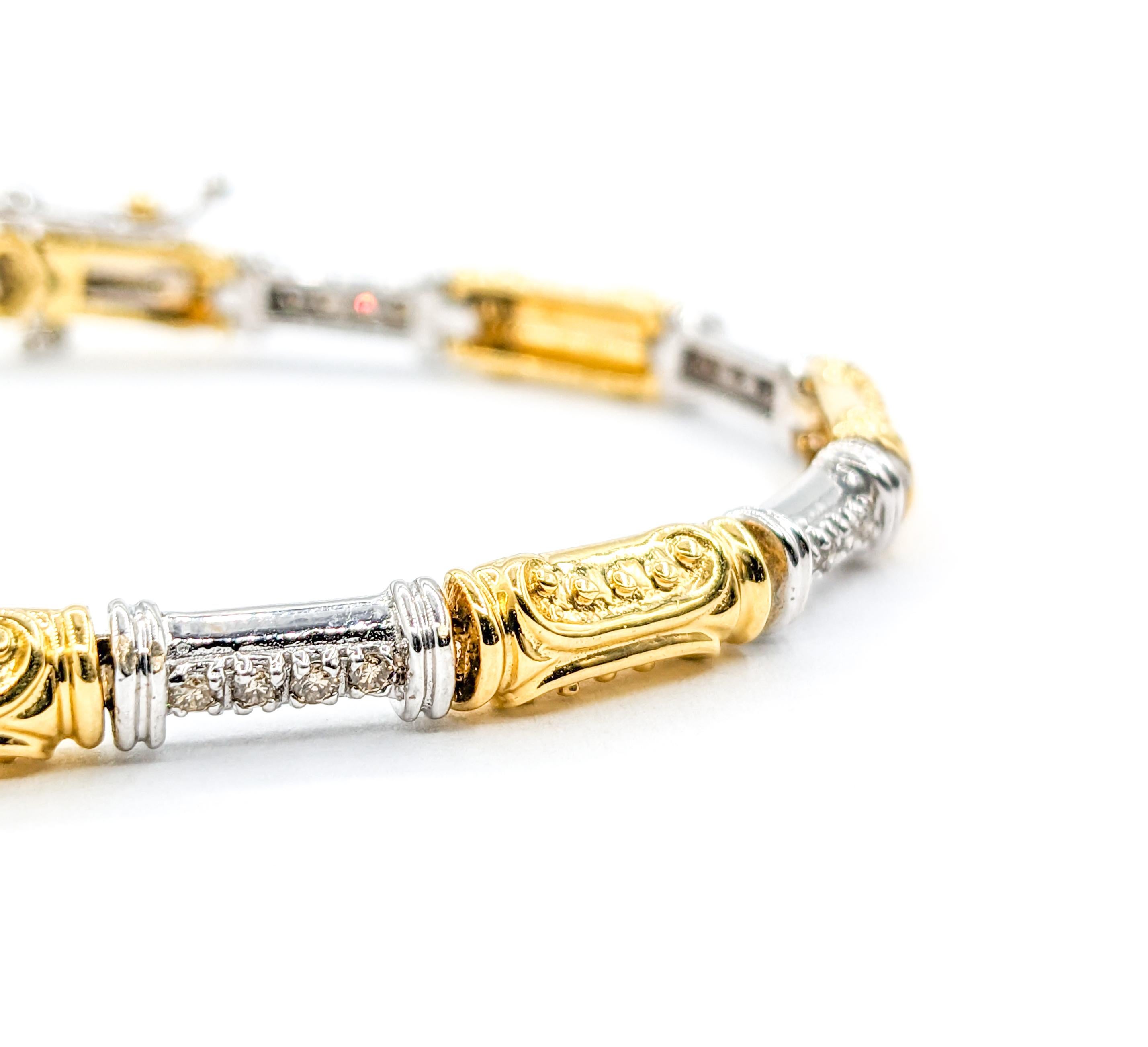 Stunning Diamond Bracelet In Two-Tone Gold

Introducing a stunning bracelet, expertly crafted in 18 karat two-tone gold. It features a dazzling array of diamonds, totaling .52 carats, each with an I1 clarity and I-J color, creating a radiant