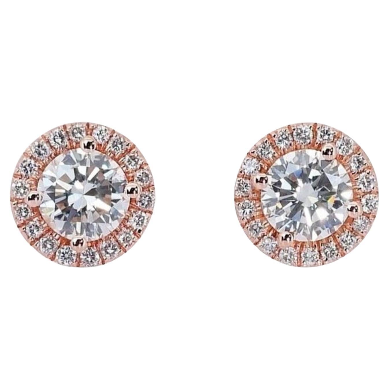 Stunning Diamond Earrings with 1.2 carat Round Brilliant Diamond For Sale