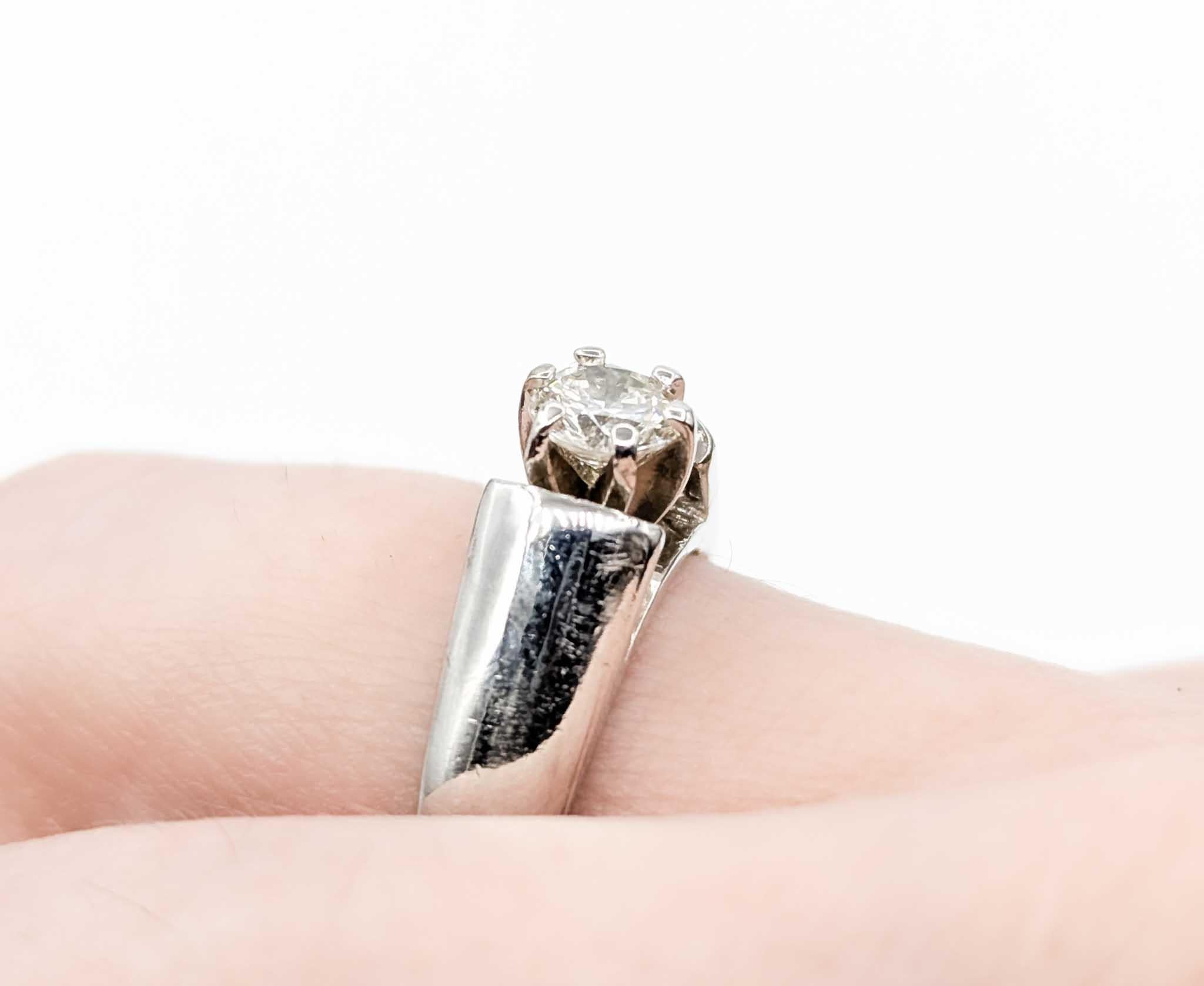 Stunning Diamond Engagement Ring Solitaire in 14k White Gold
Presenting our stunning Diamond Engagement Ring Solitaire, expertly crafted in 14k white gold with a graceful Cathedral-style setting. This timeless ring features a radiant 0.48ct diamond,