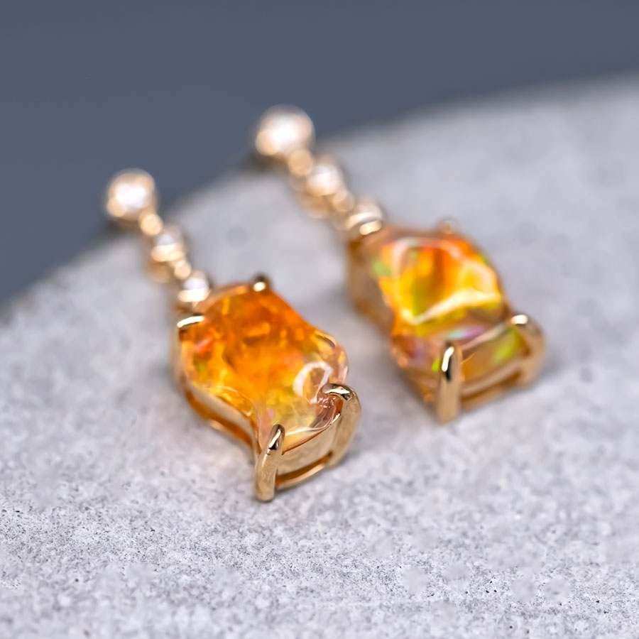 Stunning Diamond Mexican Fire Opal Asymmetric Drop Earrings in 18K Yellow Gold.


Free Domestic USPS First Class Shipping! Free Gift Bag or Box with every order!

Opal—the queen of gemstones, is one of the most beautiful gemstones in the world.