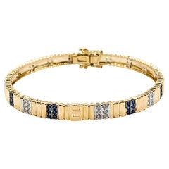 Stunning Diamond & Sapphire Bangle Bracelet in Yellow Gold