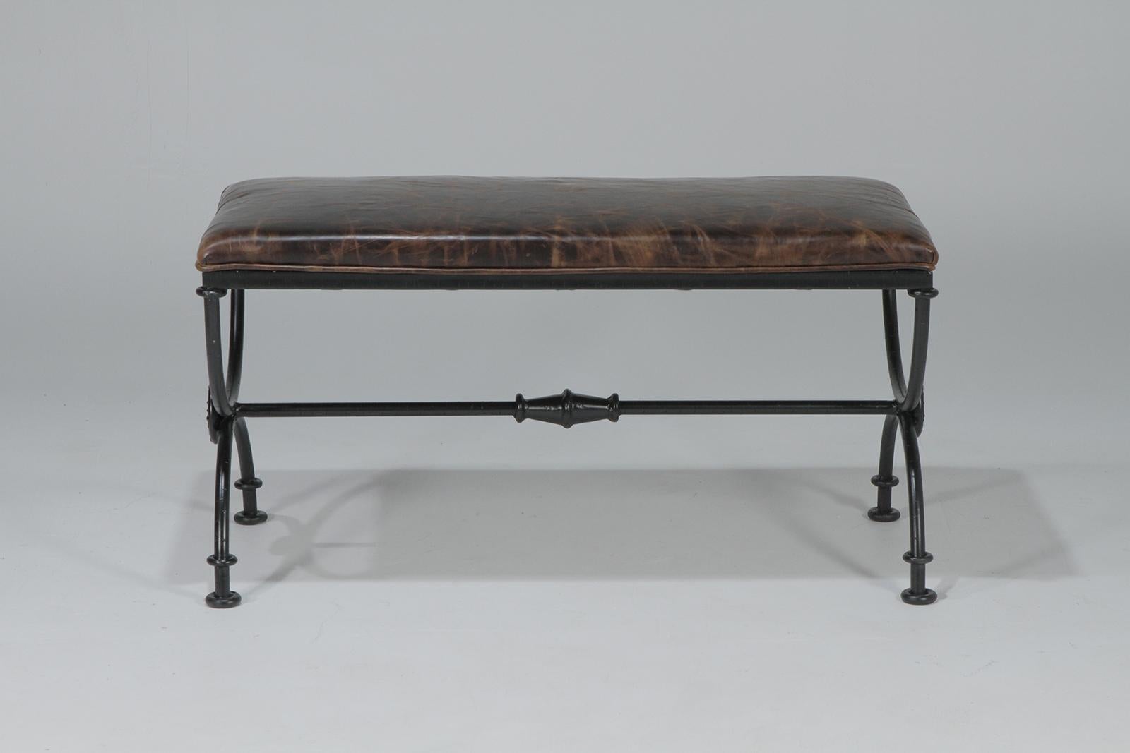 A great looking neoclassical style Italian bench having black handwrought iron base with newly upholstered brown distressed leather top. Solid and heavy construction, yet elegant, not clunky.

  