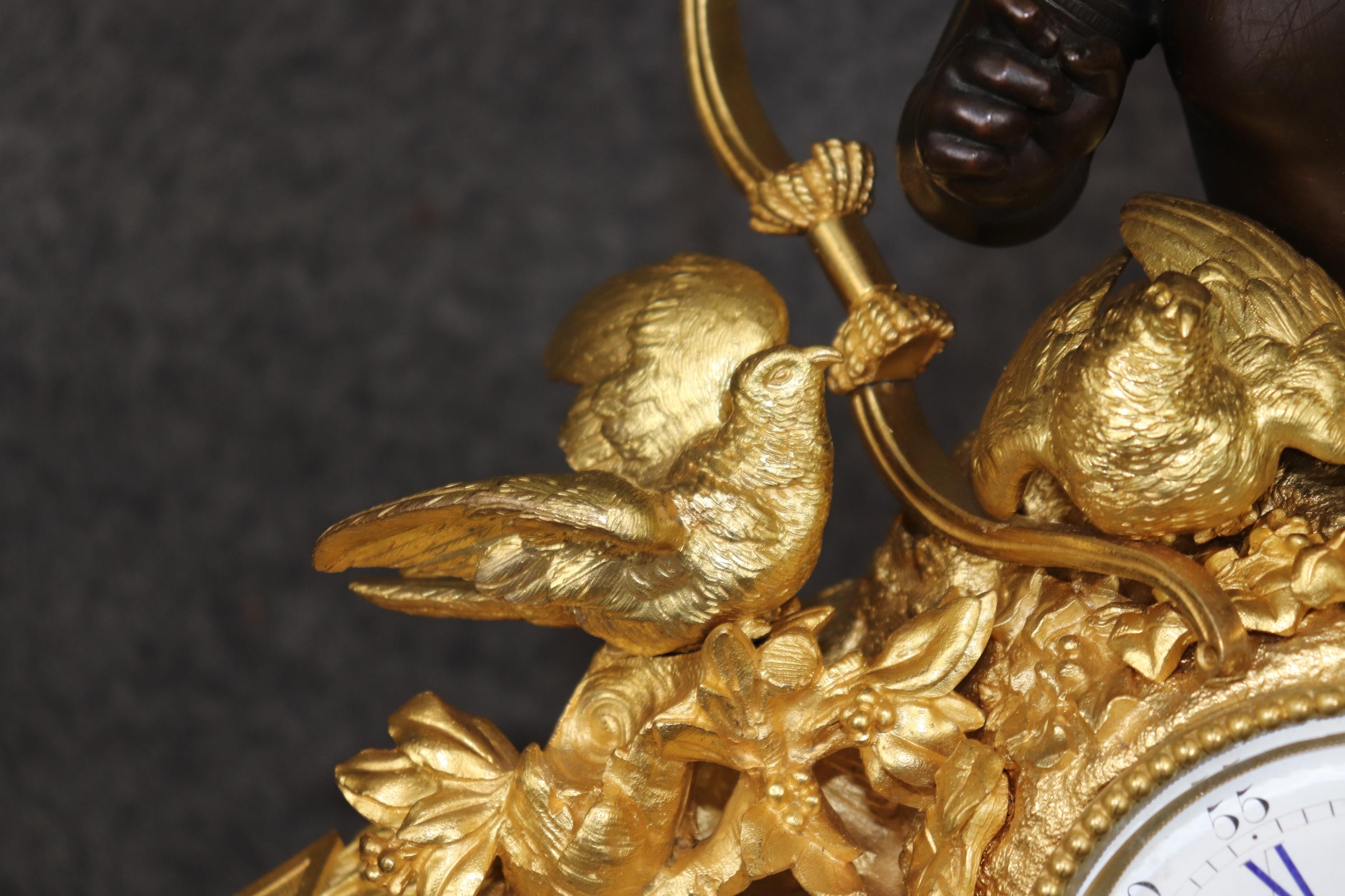 Late 19th Century Stunning Dore' Bronze and dark Bronze Cherub Mantel Clock by Vannier of Paris