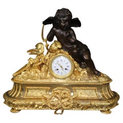 Stunning Dore' Bronze and dark Bronze Cherub Mantel Clock by Vannier of Paris
