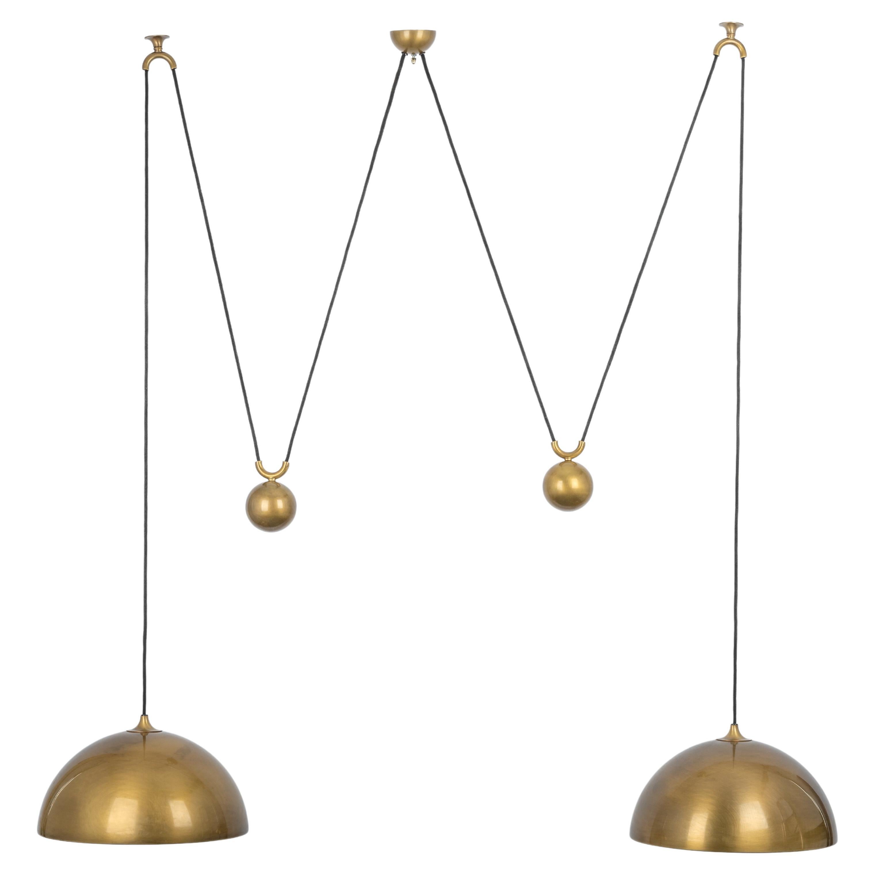Stunning Double Brass Pendant with Adjustable Counter Weights by Florian Schulz For Sale
