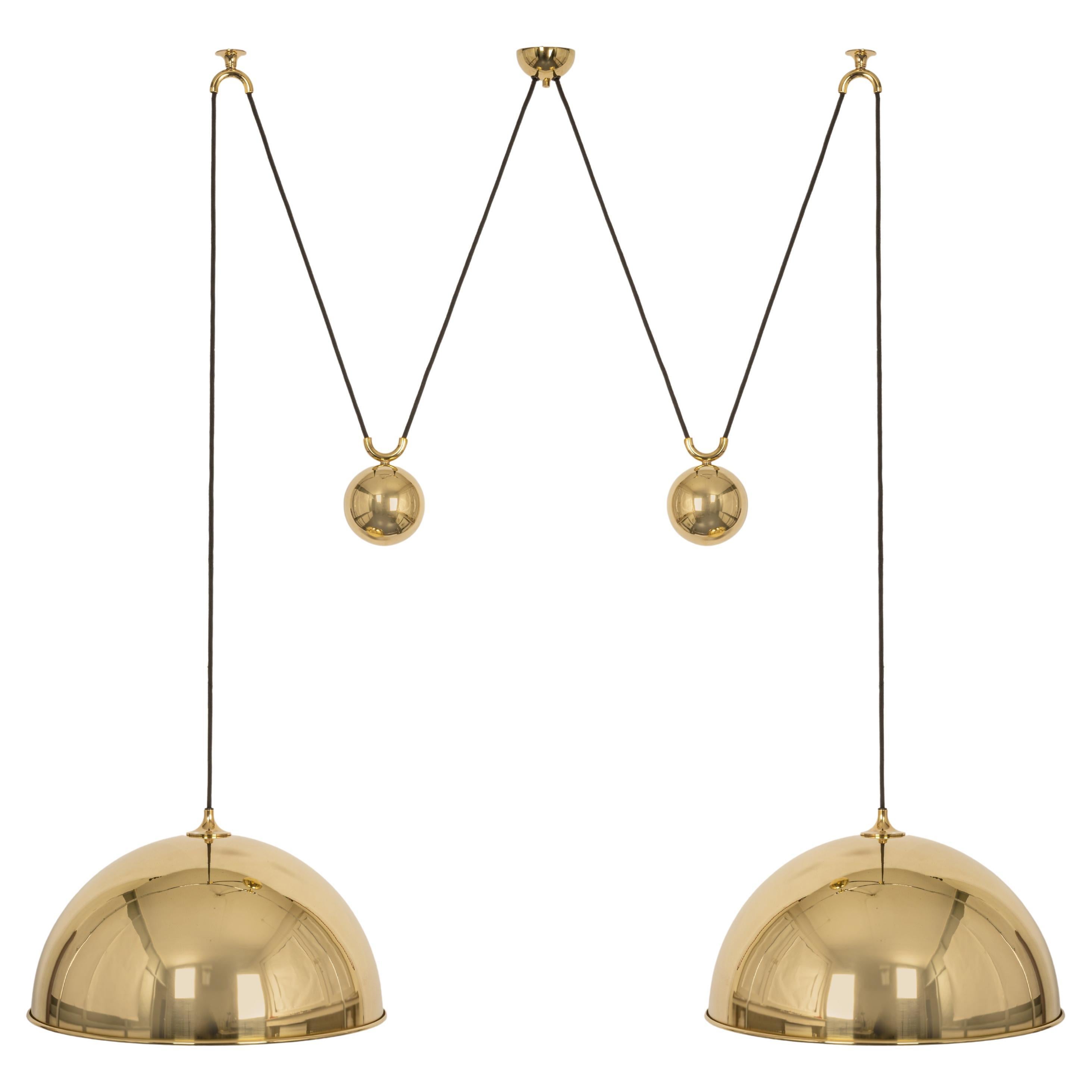 Superbe pendentif double en laiton avec contrepoids réglable de Florian Schulz