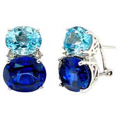 Superbes boucles d'oreilles à double topaze bleue ovale et saphir