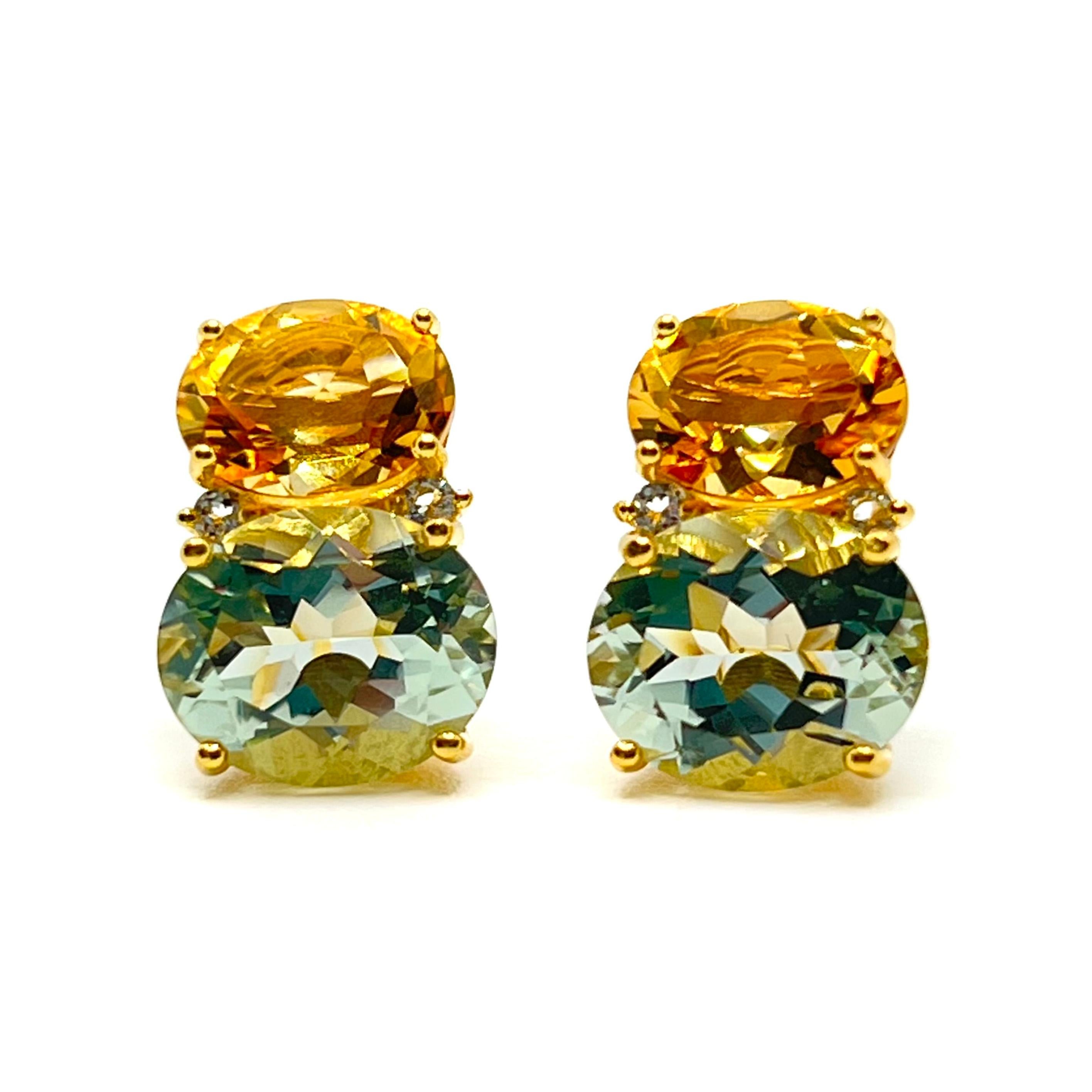 These stunning pair of earrings features a pair of genuine oval Brazilian citrine, pastel green prasiolite, adorned with round white topaz on the side, handset in 18k yellow gold vermeil over sterling silver. The golden yellow and pastel green