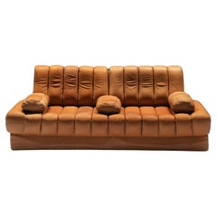 Superbe canapé/lit DS-85 en cuir cognac d'origine de l'équipe De Sede pour De Sede