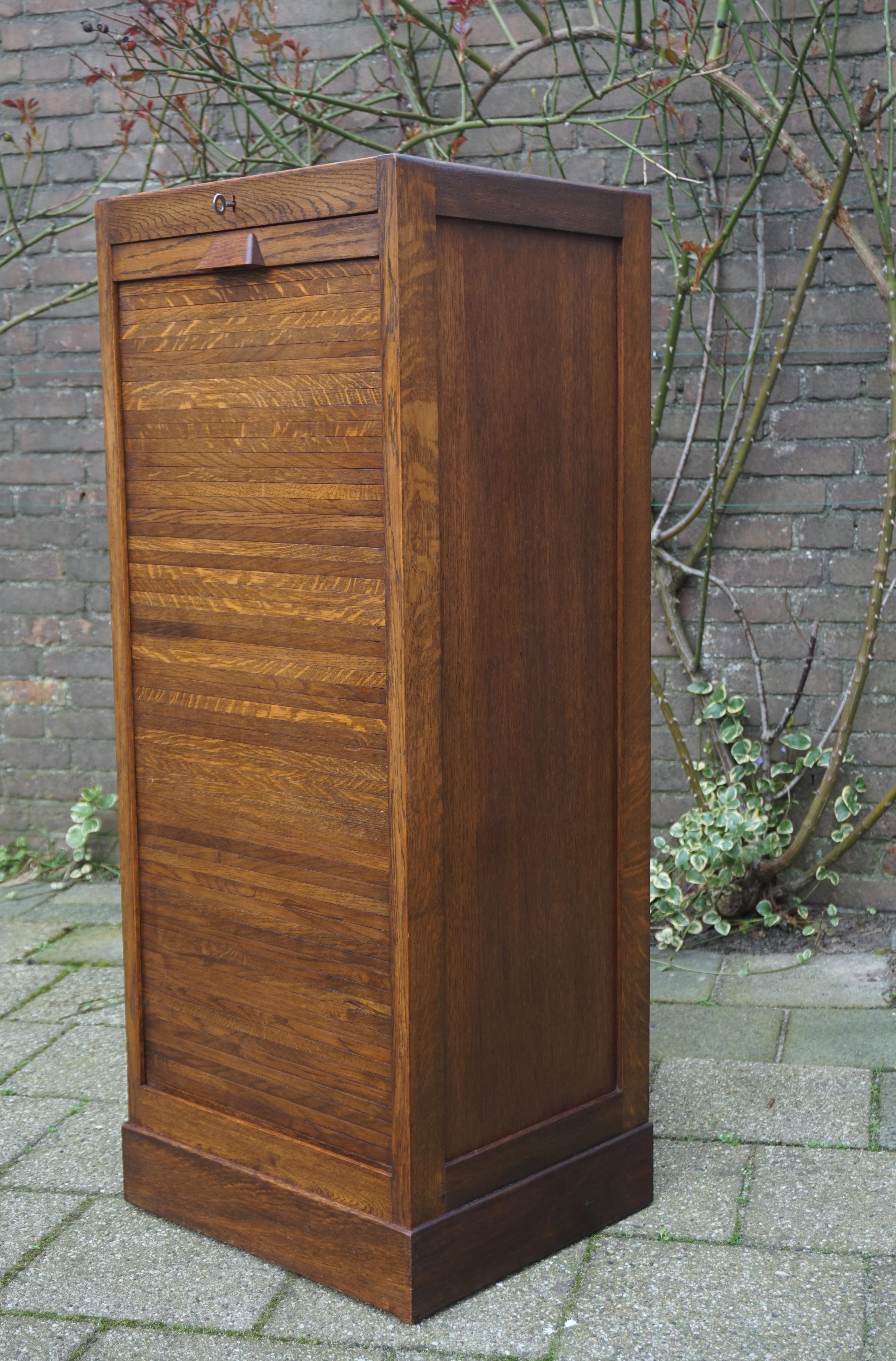 Museum quality and condition, Arts & Crafts era filing cabinet.

This Dutch filing cabinet is another fine example of the quality furniture that was made in the earliest years of the 20th century. The angular design and the warm & wonderful patina