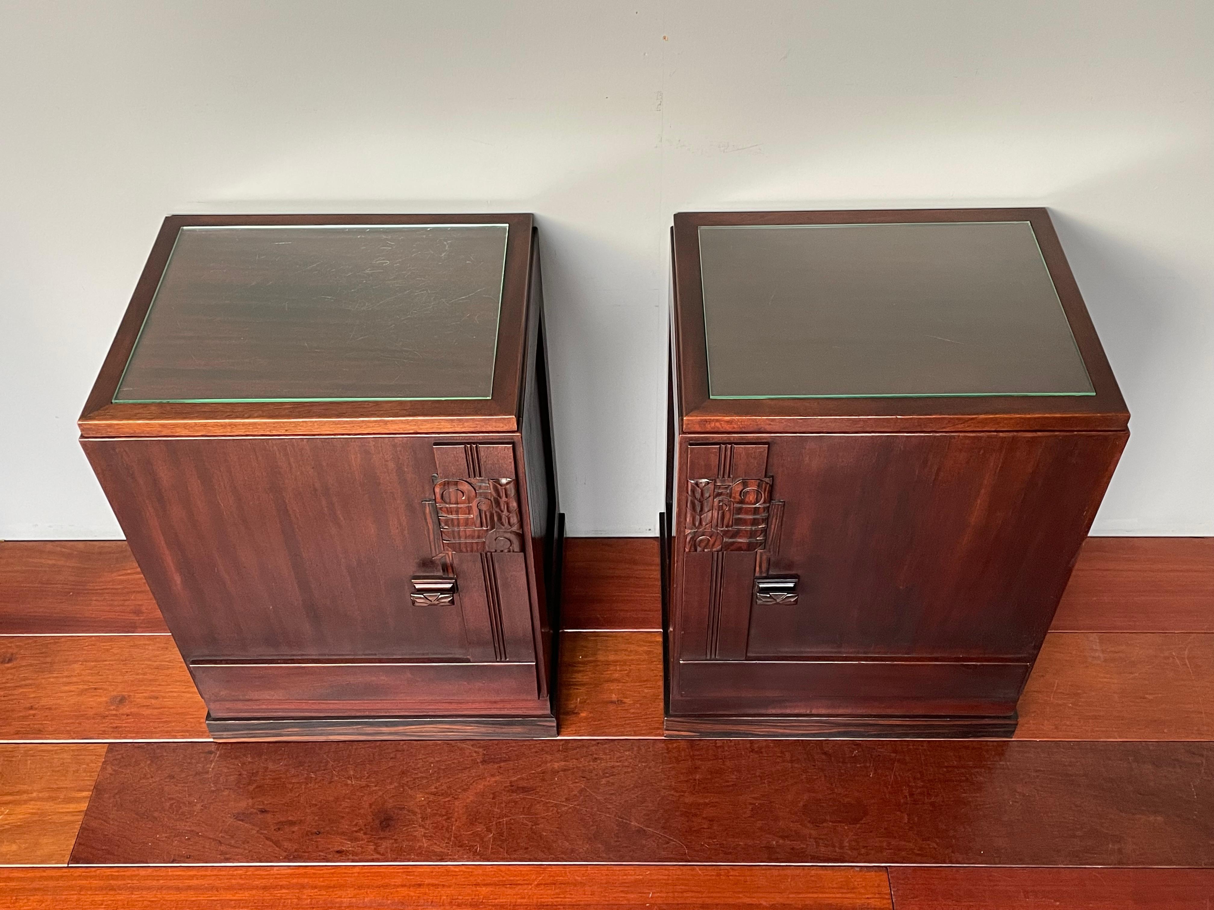Top quality and great condition, patinated nutwood, coromandel & oak cabinets by one of Holland's finest.

These beautifully designed and skillfully handcrafted nightstands date from the earliest years of the 1900s. They were undoubtedly made by