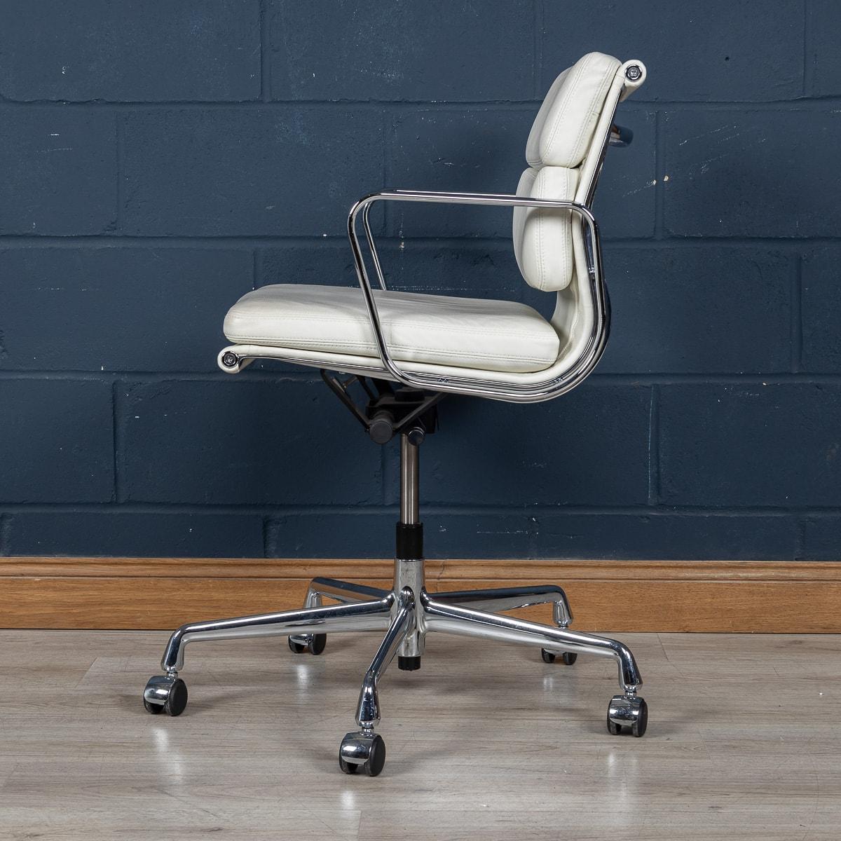 A stunning Eames chair by Vitra, of recent manufacture, in a delightful full white “snow“ leather upholstery. The white contrasts magnificently with the polished metal finish and stands on castors. Height adjustable and reclinable, the chair offers