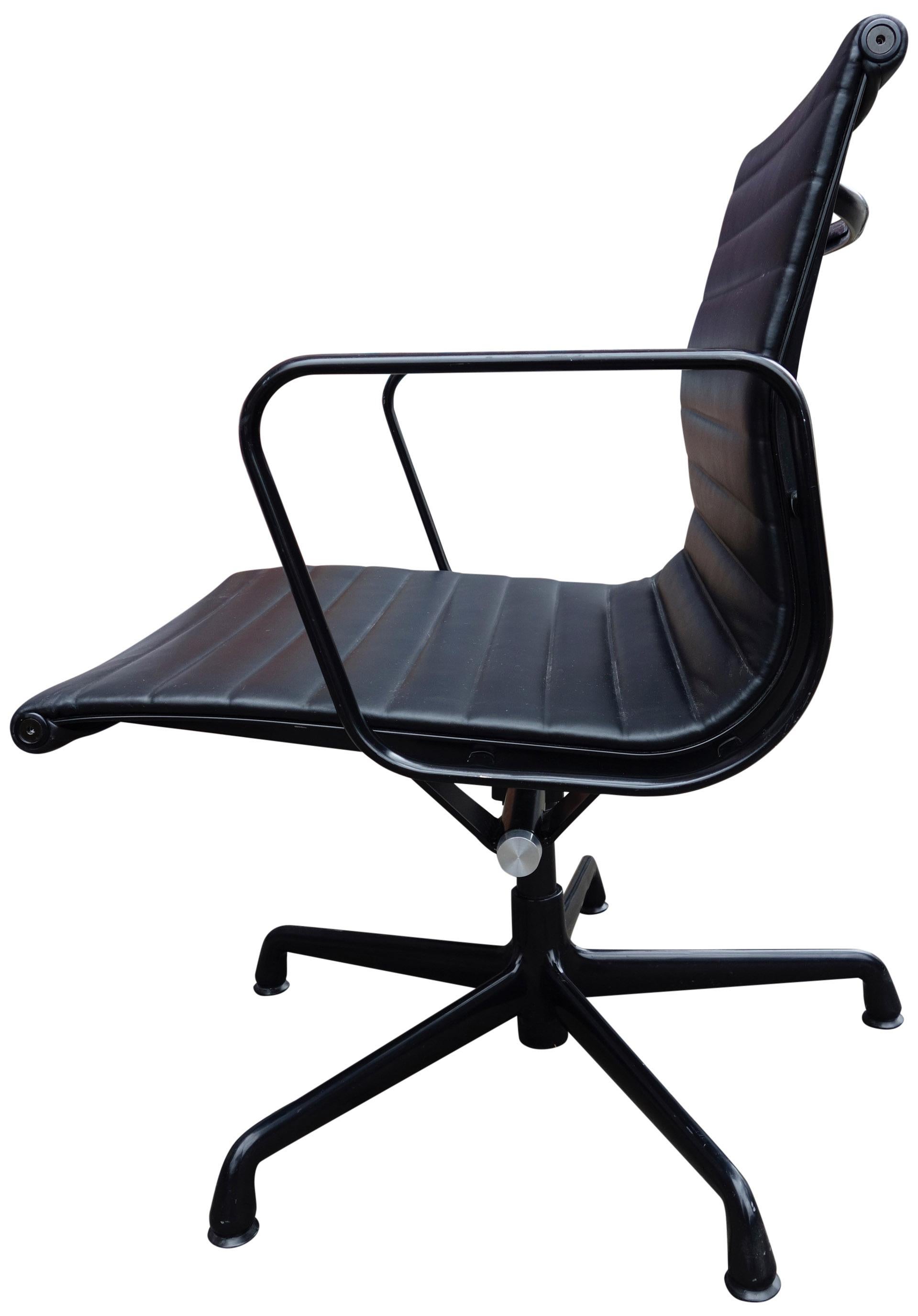 For your consideration are up to 4 midcentury Eames chairs upholstered in black leather. Featuring a wonderful black on black combination. Swivel and tilt with adjustable height. Elegance and comfort separates this iconic chair from the rest. First