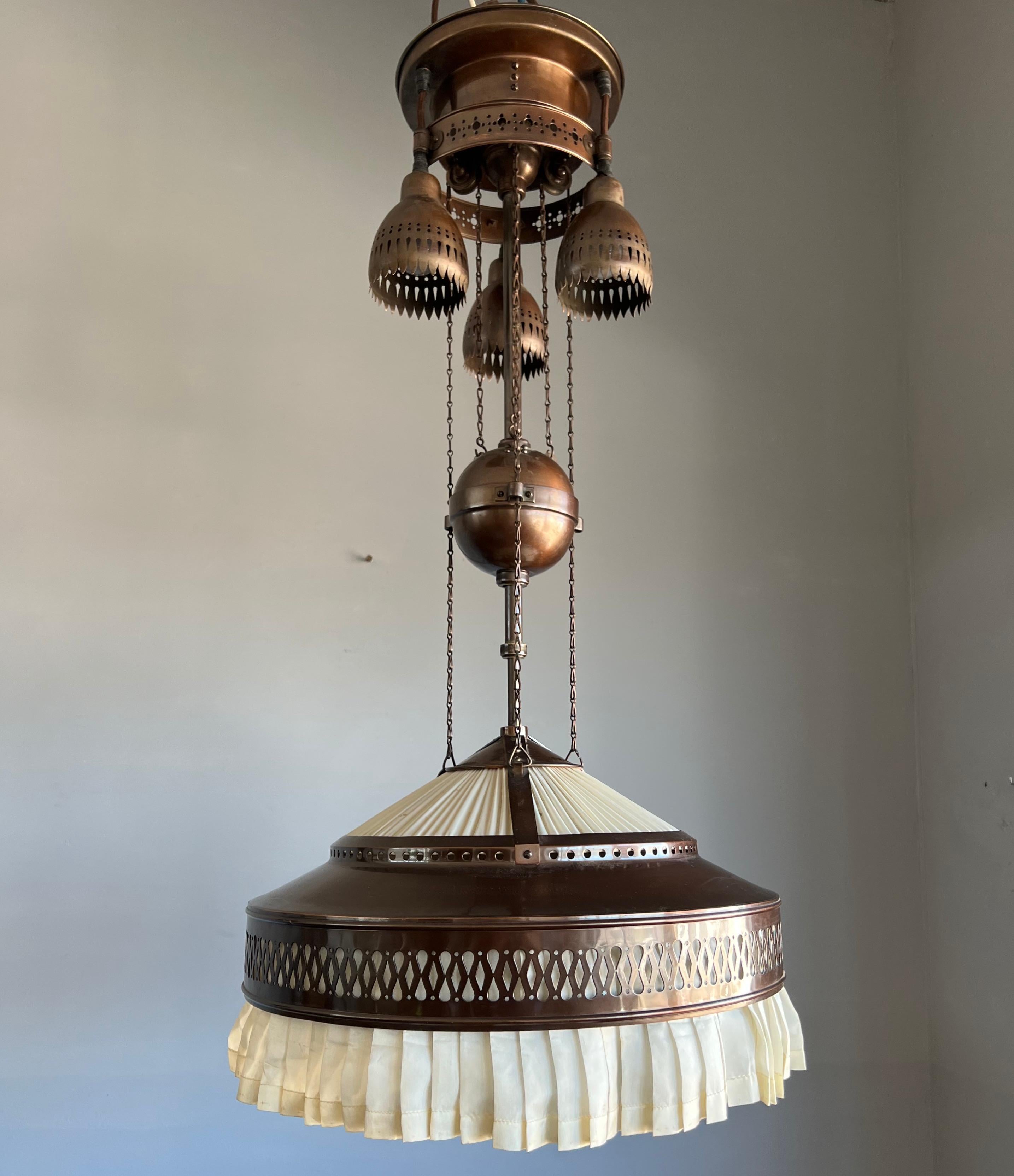 Large and striking Dutch Arts & Crafts 6-light chandelier.

If you live or work in an Arts & Crafts (inspired) building and you are looking for the perfect fixture to grace your living or work space then this very rare and all handcrafted, copper