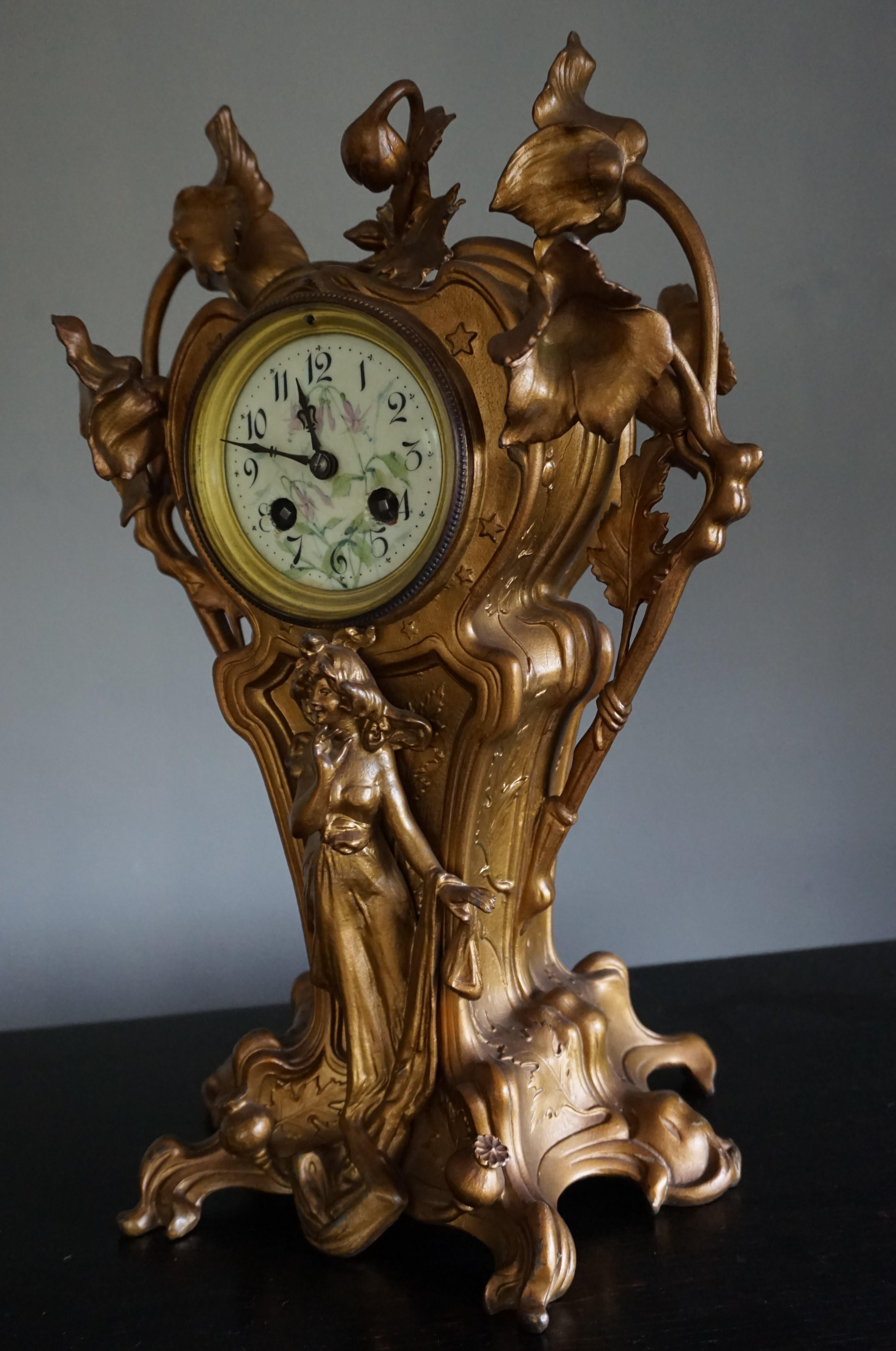 Rare Art Nouveau clock with an elegant lady sculpture.

This pure Art Nouveau clock from circa 1900-1910 has the most elegant of designs. This work of time telling art comes with a truly elegant, French lady sculpture and everything about her is