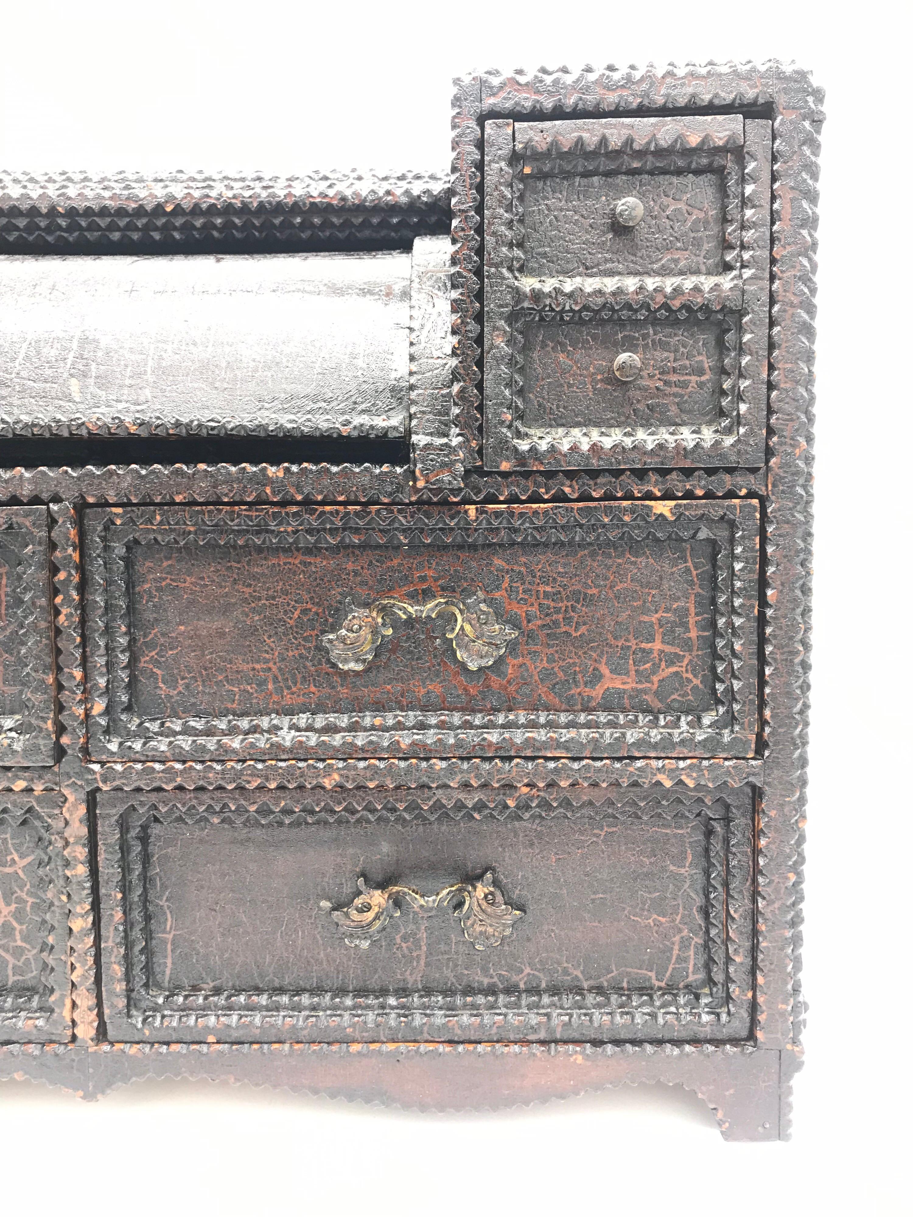 Stunning early century Danish tramp art chest of draws 
Great skill and attention to detail 
Very solid piece with not much wear but the varnish has a beautiful patina where it has aged over the many decades 
4 small and 4 large draws 
A screen